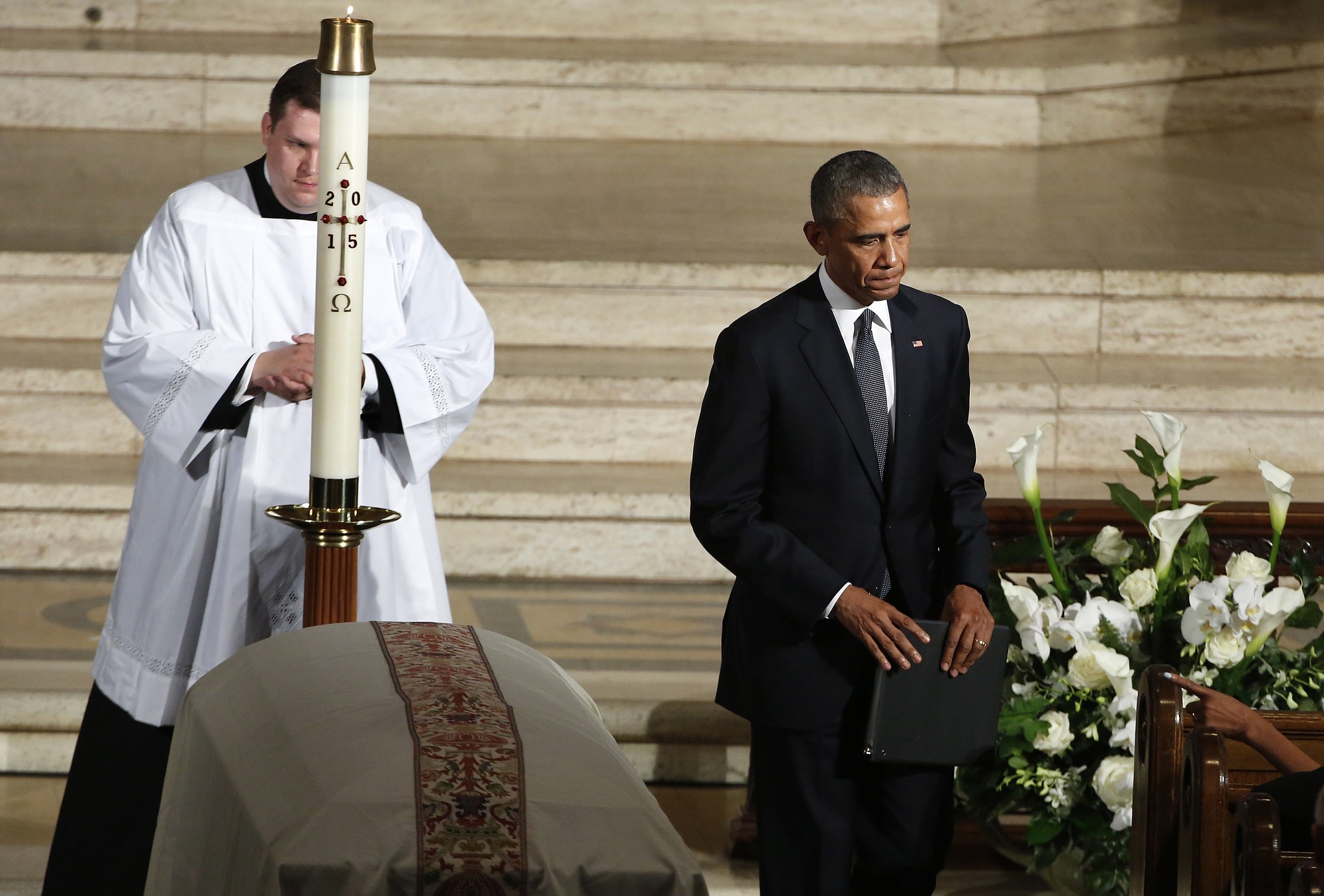 President Barack Obama leaves after delivering the eulogy during funeral services for Vice President Joe Biden's son, Beau Biden, on Saturday at St.