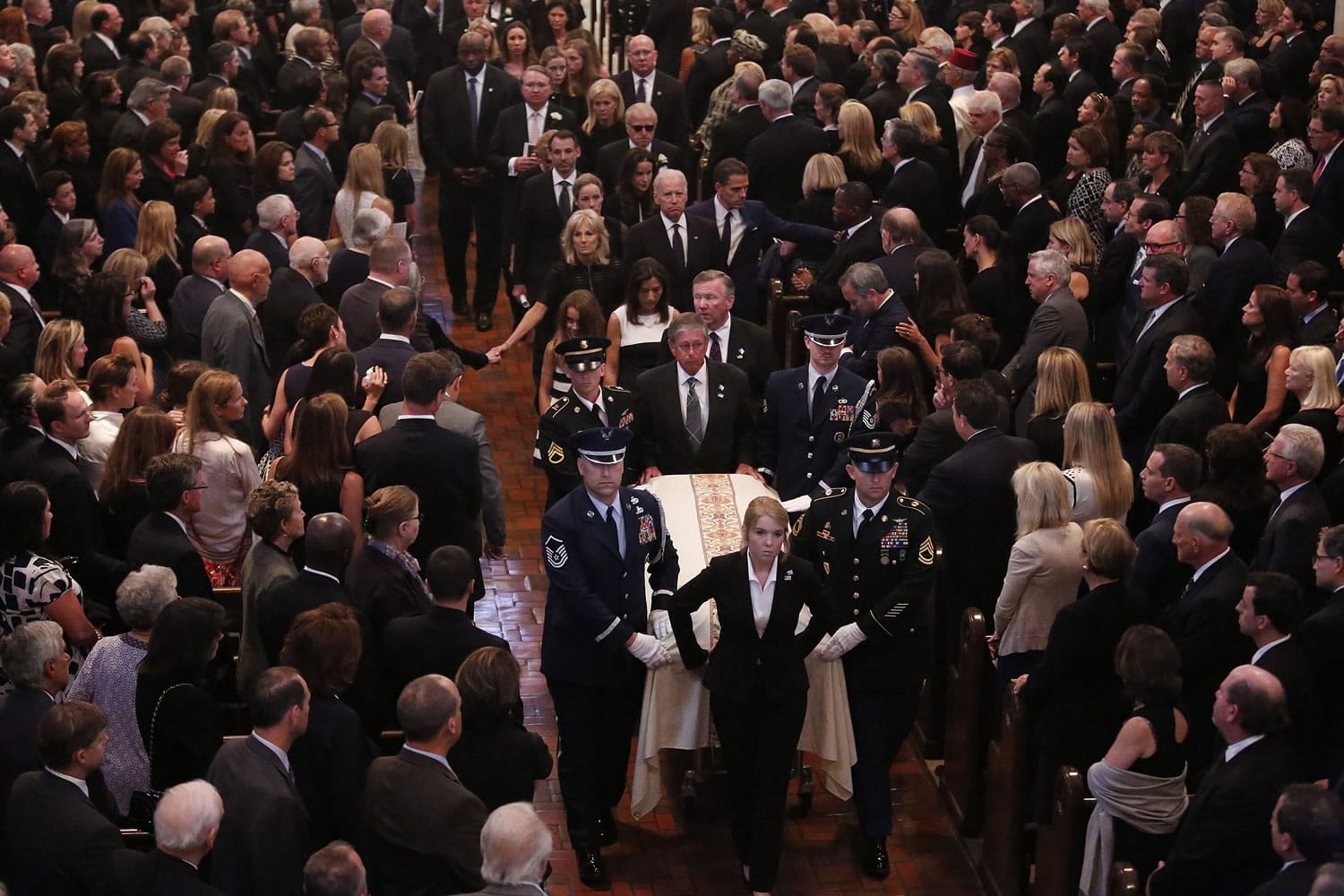 Vice President Joe Biden, his wife Jill Biden, and family members follow the casket Saturday during funeral services Biden's son, Beau Biden, at St.