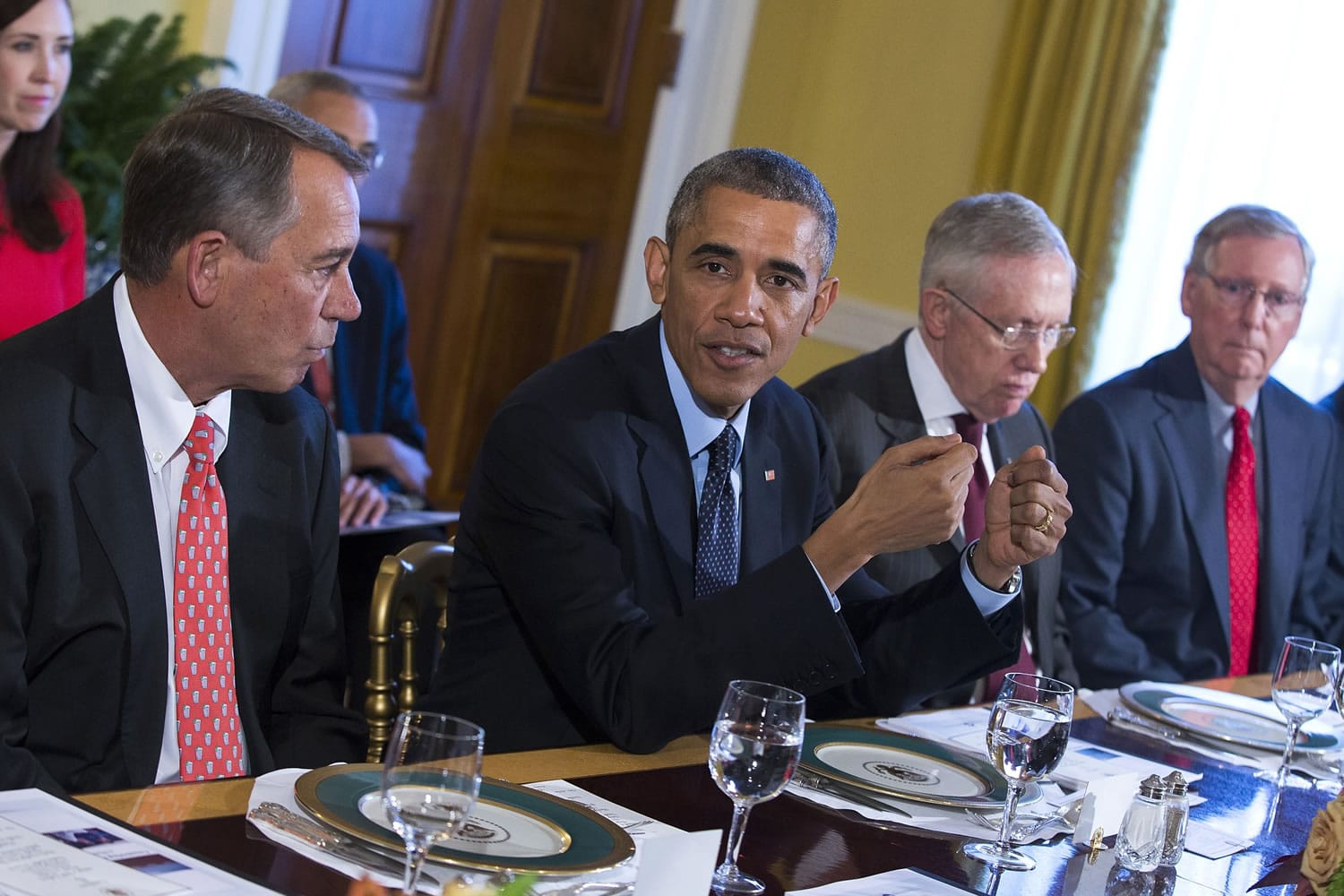 President Barack Obama meets with congressional leaders Friday in the Old Family Dining Room of the White House in Washington. From left are House Speaker John Boehner of Ohio, Obama, Senate Majority Leader Harry Reid of Nevada, and Senate Minority Leader Mitch McConnell of Kentucky.