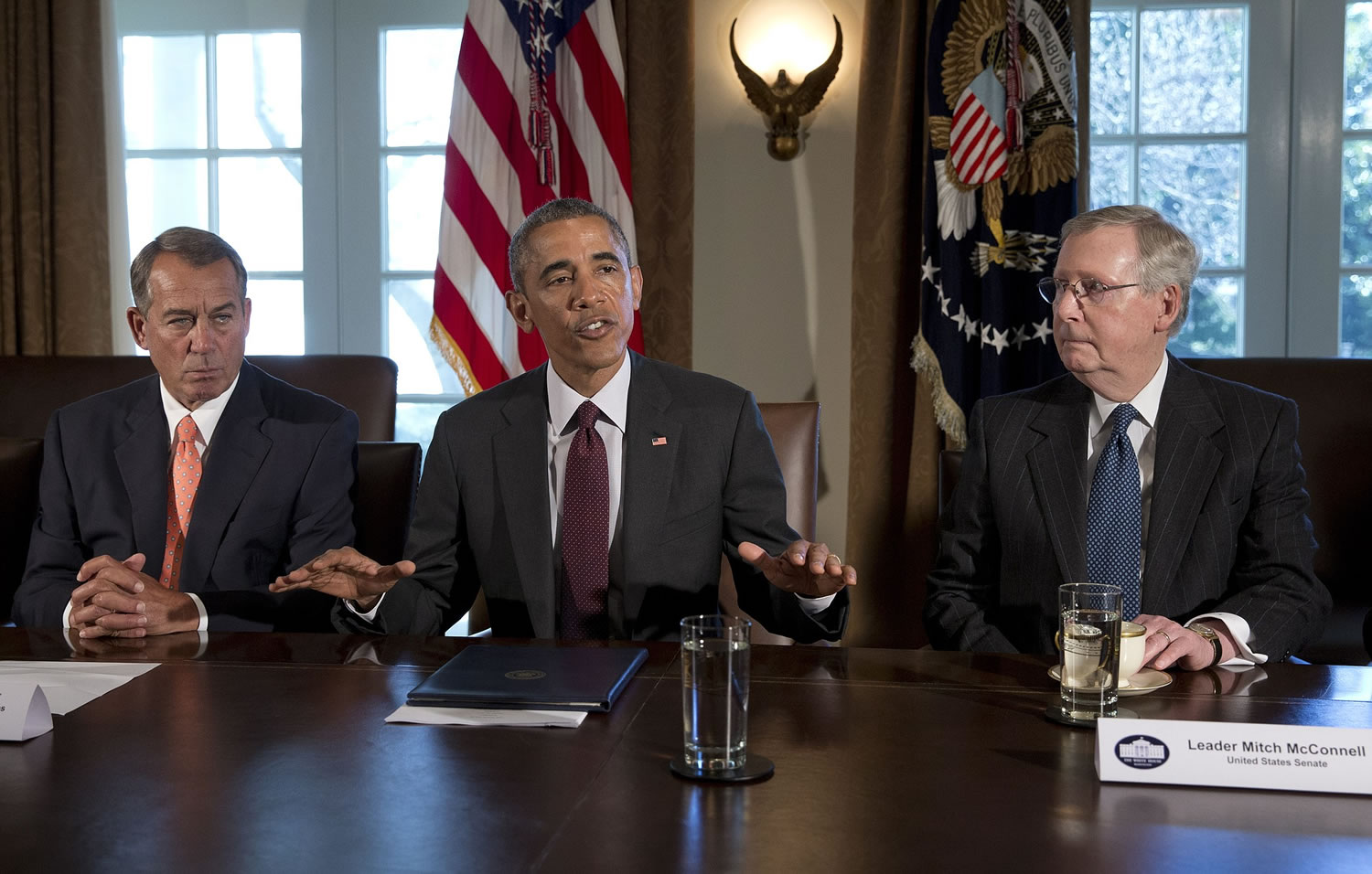 President Barack Obama, center, joined by House Speaker John Boehner of Ohio, left, and Senate Majority Leader Mitch McConnell of Kentucky speaks to media Tuesday at the White House before his meeting with bipartisan, bicameral leadership of Congress to discuss a wide range of issues.