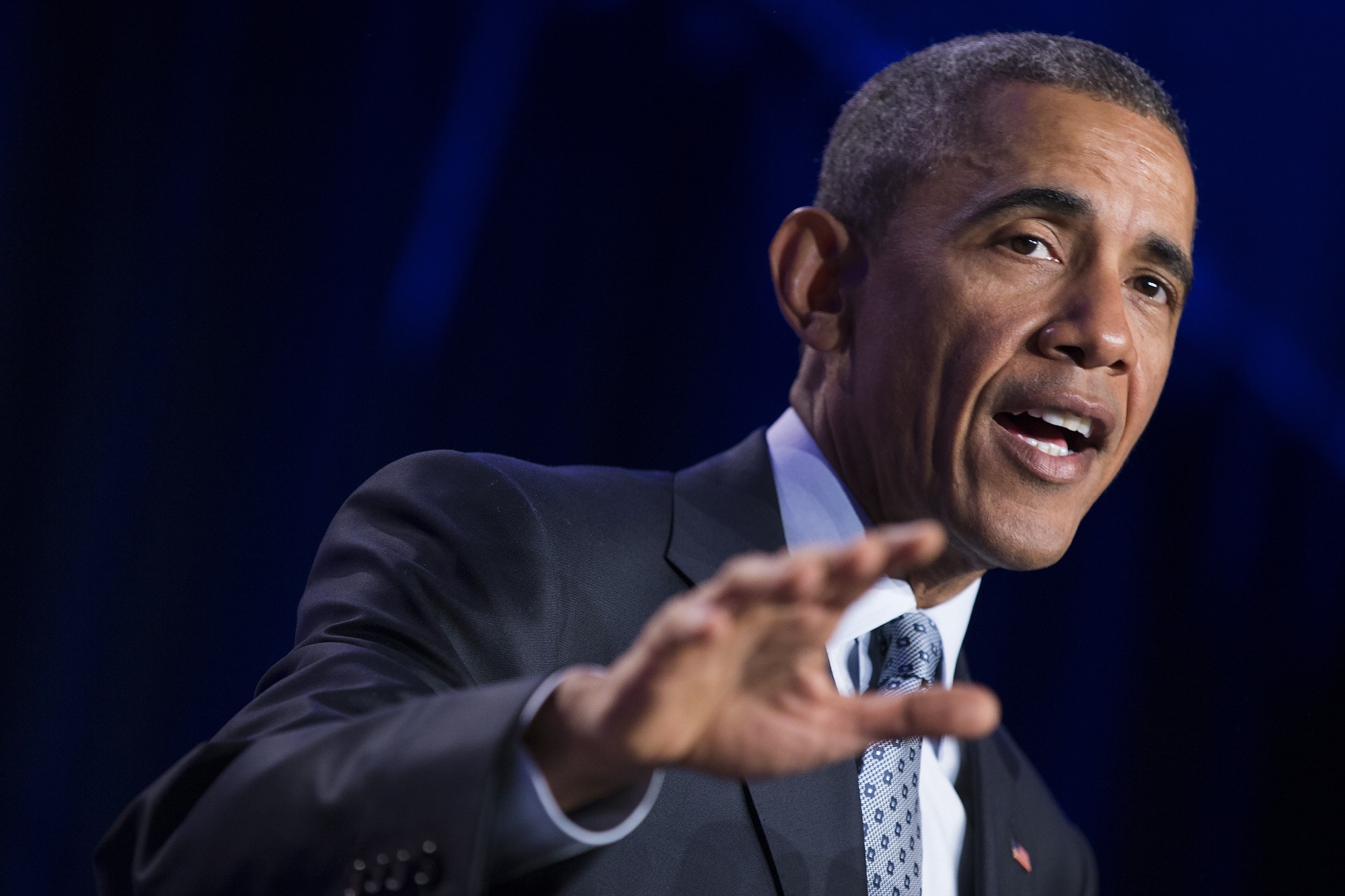 President Barack Obama speaks at the Democratic National Committee winter meeting in Washington on Friday.