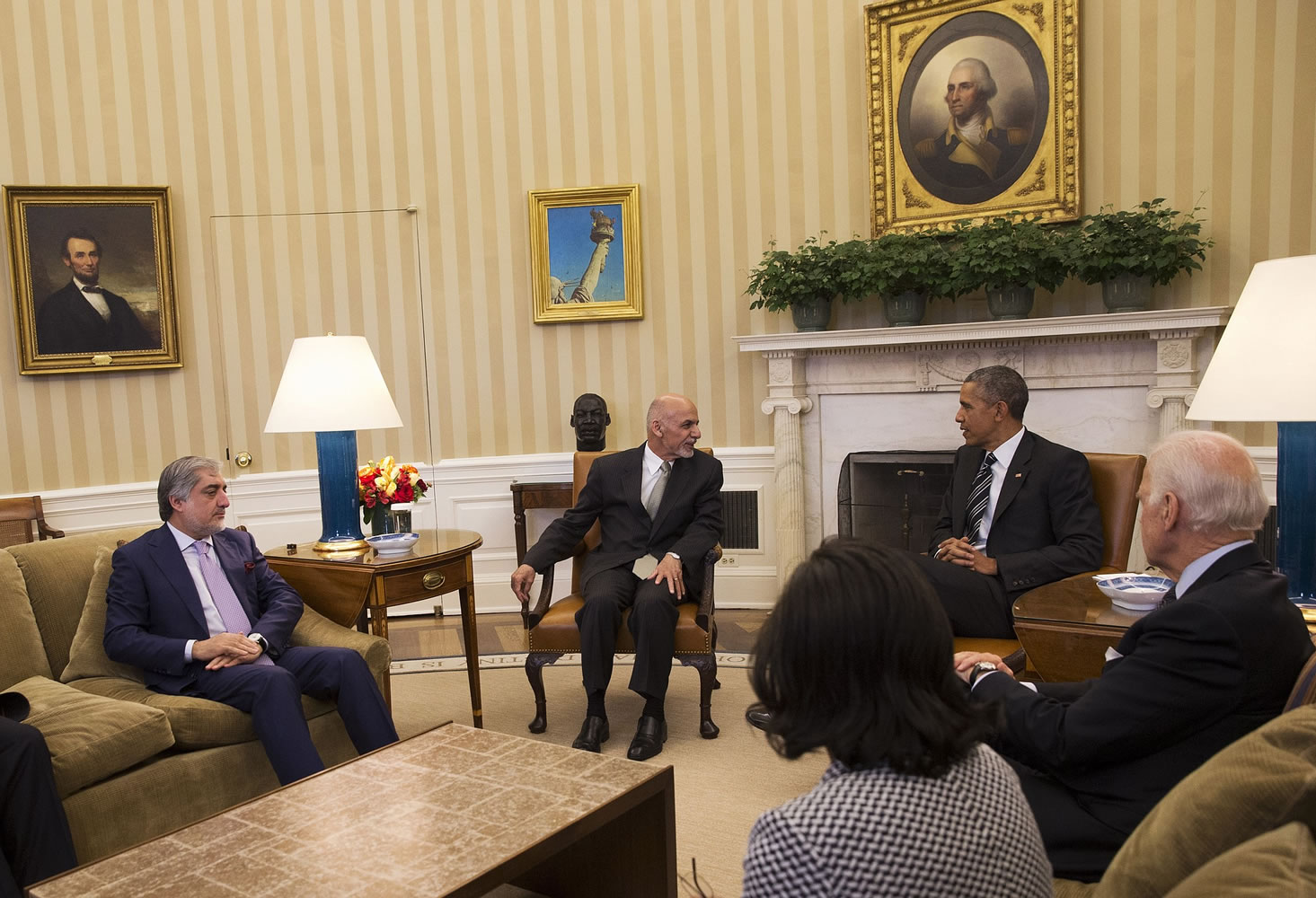 President Barack Obama and Vice President Joe Biden meet with Afghanistan's President Ashraf Ghani, center and Afghanistan's Chief Executive Officer Abdullah Abdullah, left, Tuesday in the Oval Office of the White House in Washington.