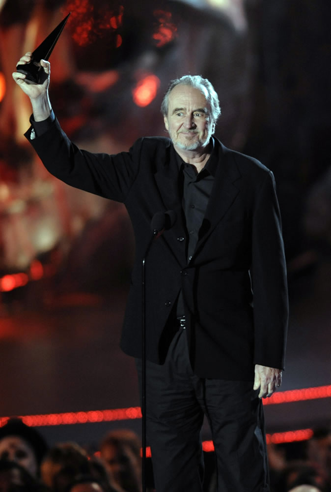 Director Wes Craven accepts Oct. 18, 2008 the Visionary Award at the Scream Awards in Los Angeles. Craven, whose "Nightmare on Elm Street" and "Scream" movies made him one of the most recognizable names in the horror film genre, has died. He was 76. Craven's family said in a statement that he died in his Los Angeles home Sunday after battling brain cancer.