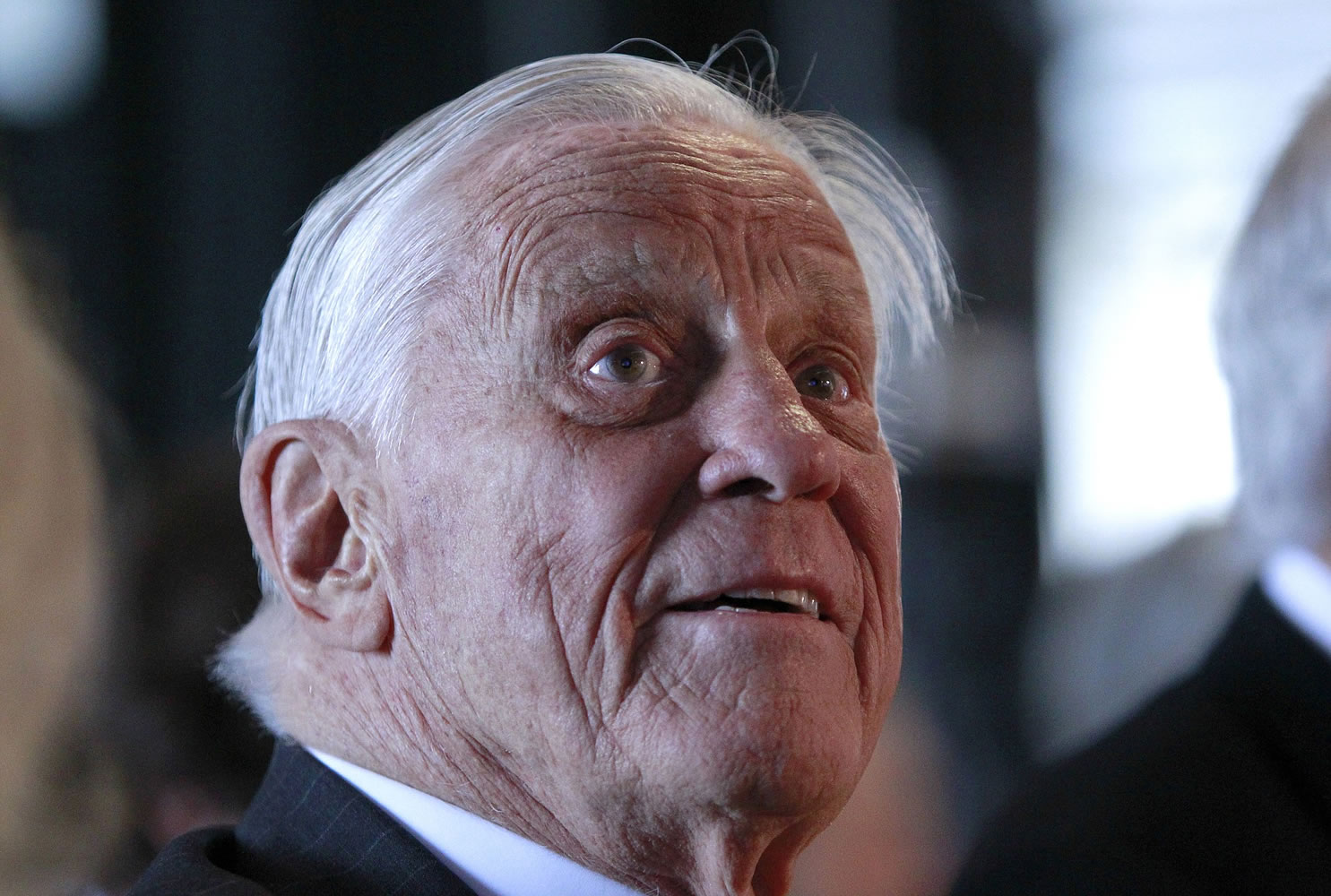 Ben Bradlee, former executive editor of The Washington Post, listens June 11, 2012 during an event sponsored by The Washington Post to commemorate the 40th anniversary of Watergate, at the Watergate office building in Washington. Bradlee died Tuesday, according to the Washington Post.