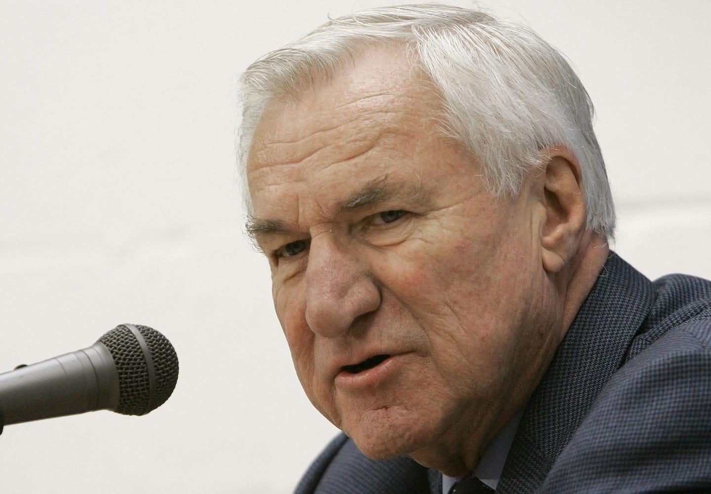 Former North Carolina basketball coach Dean Smith, pictured here 2006, died &quot;peacefully&quot; at his home Saturday night, Feb. 7, 2015, the school said in a statement Sunday from Smith's family. He was 83.