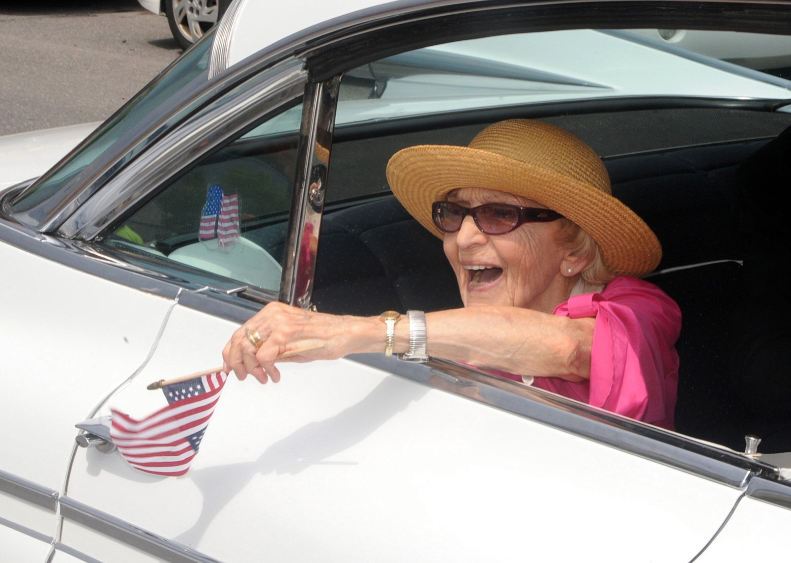 Parade grand marshall actress Ellen Albertini Dow waves to the crowd as she rides in the back of a classic car June 30, 2012 during the Six-County Firemen's Parade in Mount Carmel, Northumberland County. Dow, a feisty and fiercely independent character actor best known for her salty rendition of &quot;Rapper's Delight&quot; in &quot;The Wedding Singer,&quot; died Monday according to her agent Juliet Green.