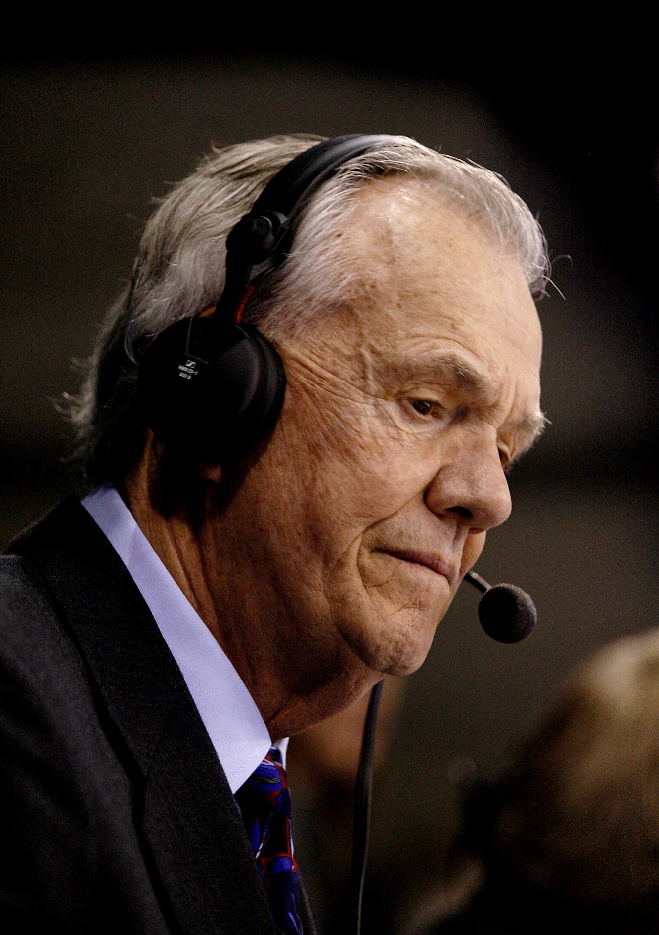 In this Jan. 7, 2009, file photo, Utah Jazz broadcaster Rod Hundley prepares for his 3,000th broadcast with the Jazz. Hundley, the former NBA player who broadcast Jazz games in New Orleans and Utah for 35 years, died Friday, March 27, 2015. He was 80. The Jazz said Hundley died at his home in the Phoenix area. (AP Photo/Steve C.