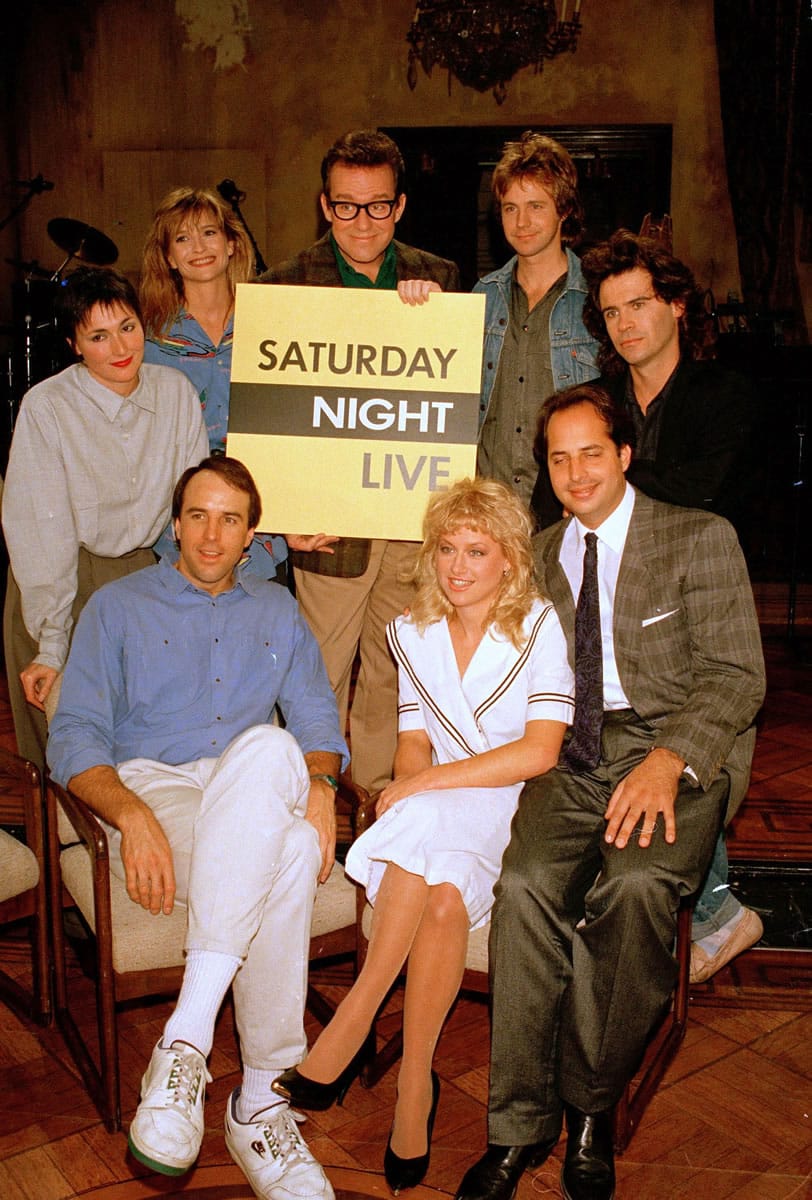 The cast of NBC's &quot;Saturday Night Live,&quot; clockwise, from left, Nora Dunn, Jan Hooks, Phil Hartman, Dana Carvey, Dennis Miller, Jon Lovitz, Victoria Jackson, and Kevin Nealon, pose together in New York on Dec. 9, 1986. Hooks has died. She was 57.