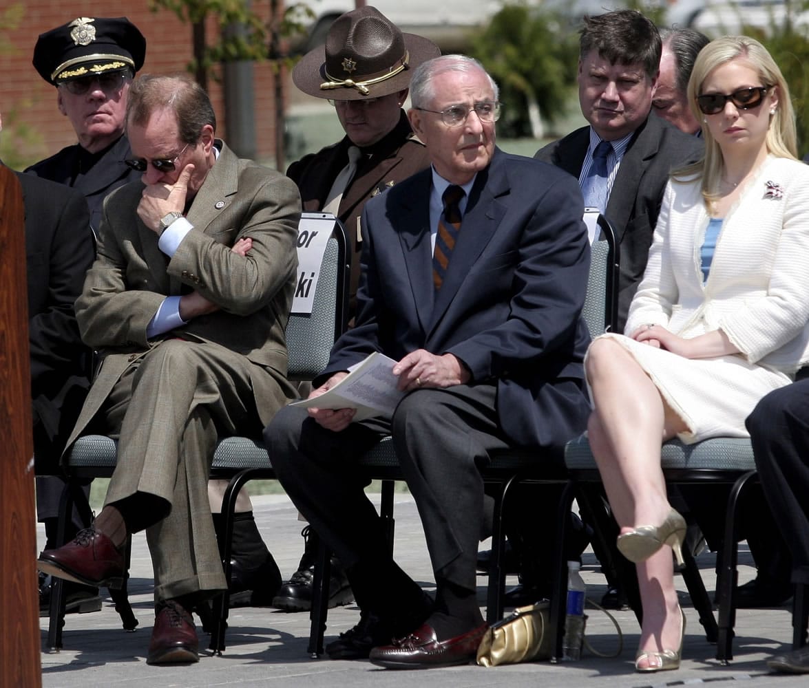 Attending dignitaries including Oregon Gov. Ted Kulongoski, left, former Gov. Vic Atiyeh, center, and 2002 Miss America Katie Harmon sit, as the names of officers killed in the line of duty are read May 11, 2006 during the Oregon Law Enforcement Memorial ceremony at the new public-safety academy grounds in Salem, Ore. Atiyeh, Oregonu2019s last Republican governor who shepherded the state through a deep recession during two terms in the 1980s, died Sunday, July 20, 2014, a family spokesman said. The former governor died at 8:15 p.m. at Portlandu2019s Providence St. Vincent Medical Center of complications from renal failure, said Denny Miles, who had formerly served as Atiyehu2019s press secretary.