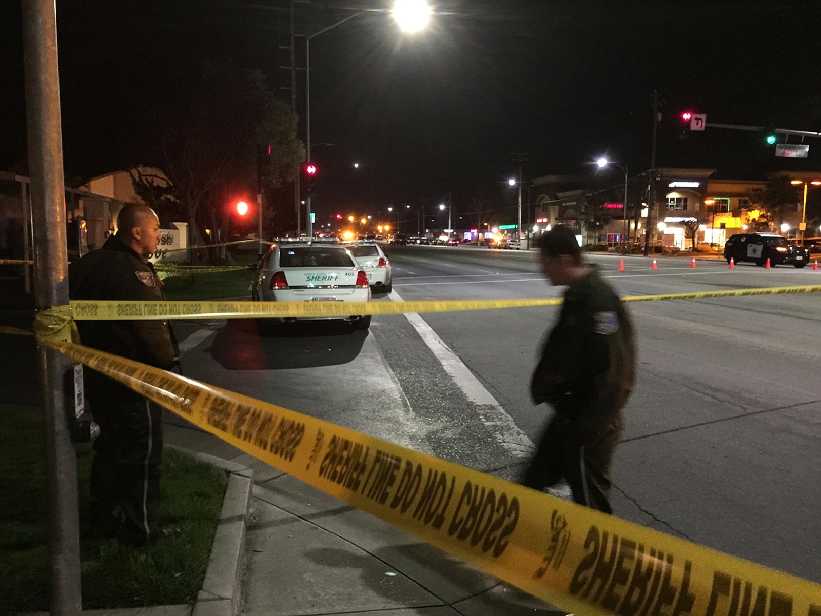 Law enforcement officers have an area blocked off as they search for a suspect in the fatal shooting of a San Jose, Calif., police officer Tuesday.