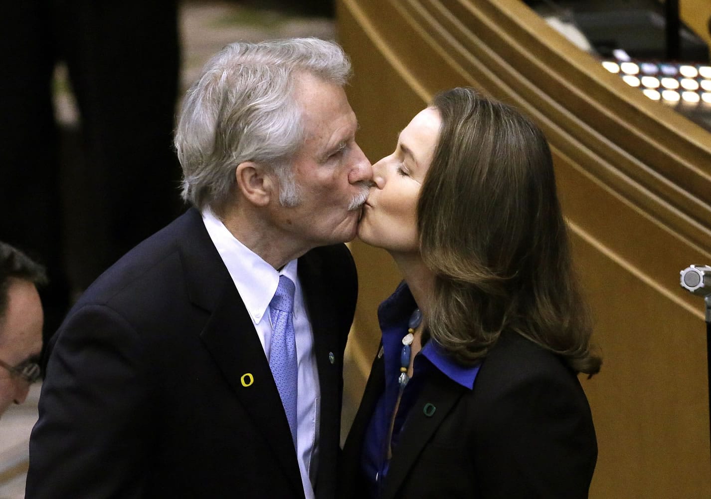 Oregon Gov. John Kitzhaber kisses fiancee, Cylvia Hayes, Jan. 12 after he is sworn in for an unprecedented fourth term as governor in Salem, Ore.