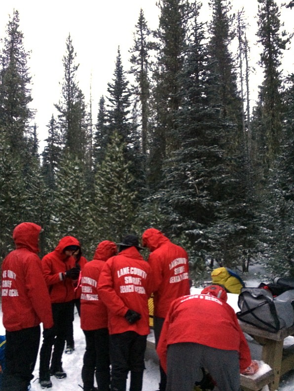 Lane County Sheriff
Search and rescue members gather on central Oregon's Middle Sister mountain Friday, near Sisters, Ore., as the search for a missing climber continues.