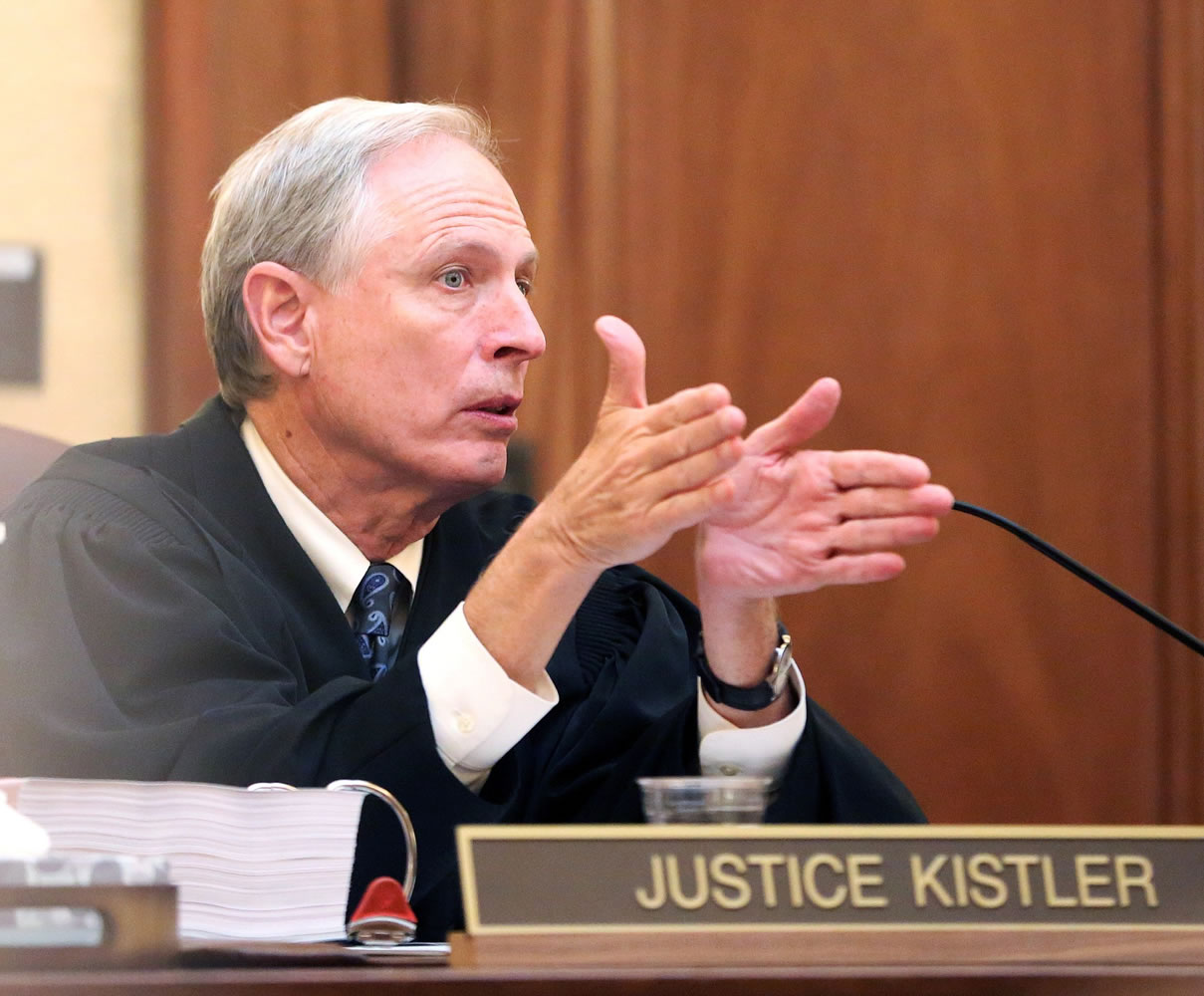 Justice Rives Kistler speaks during oral arguments in the Public Employees Retirement System case at the Oregon Supreme Court in Salem, Ore., on Tuesday.