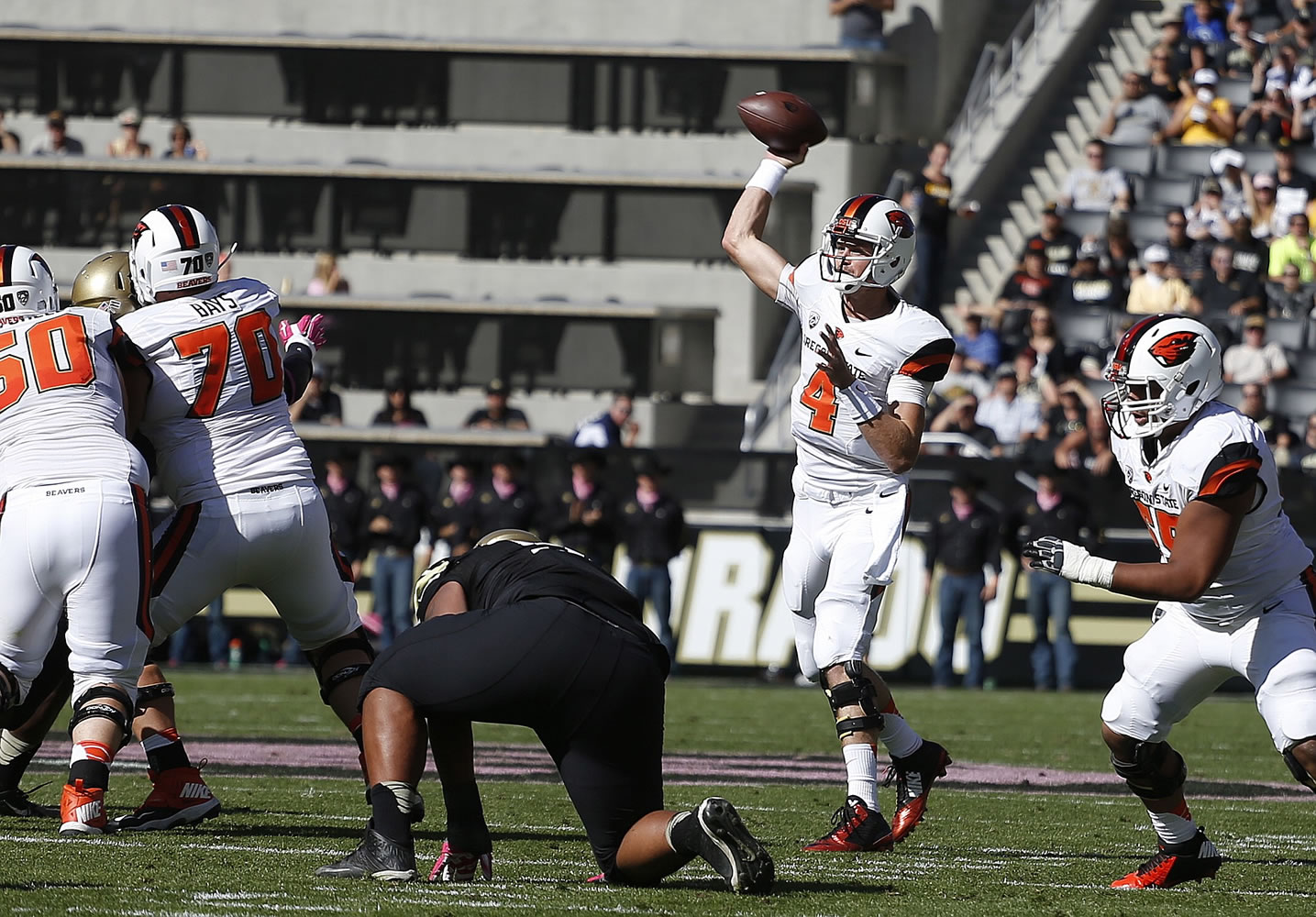 Oregon State quarterback Sean Mannion throws during the first half of an NCAA college football game against Colorado in Boulder, Colo., Saturday, Oct. 4, 2014.