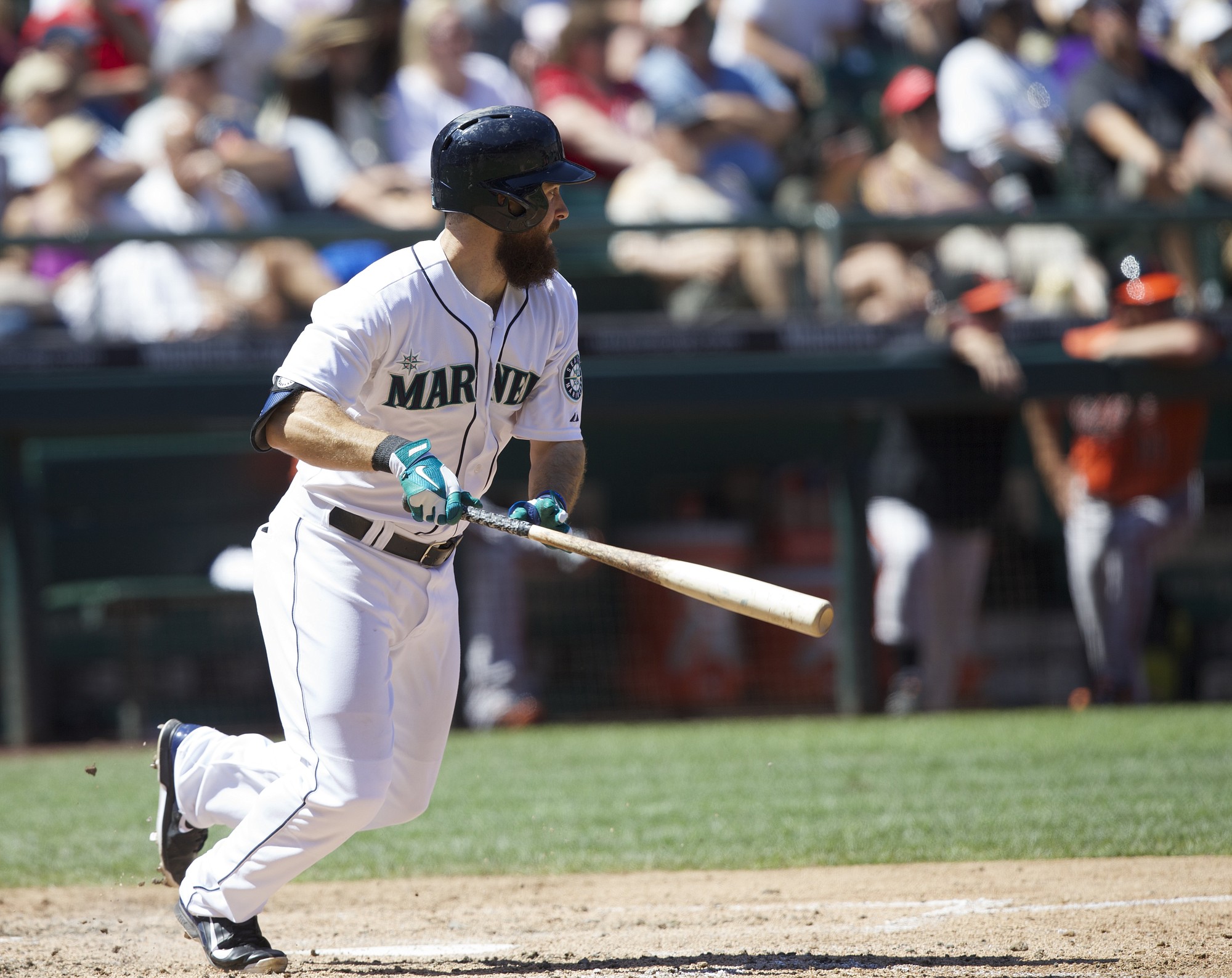 Seattle Mariners' Dustin Ackley runs to first as he hits a double in the fifth inning Saturday against the Baltimore Orioles.
