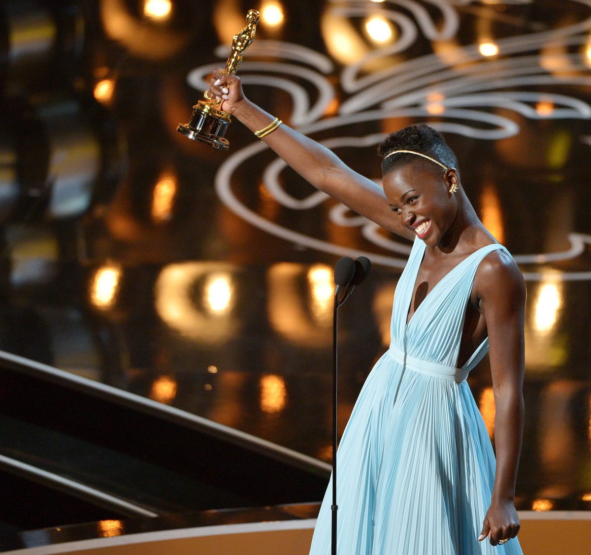 Lupita Nyong'o accepts the award for best actress in a supporting role for &quot;12 Years a Slave&quot; during March 2 the Oscars in Los Angeles.