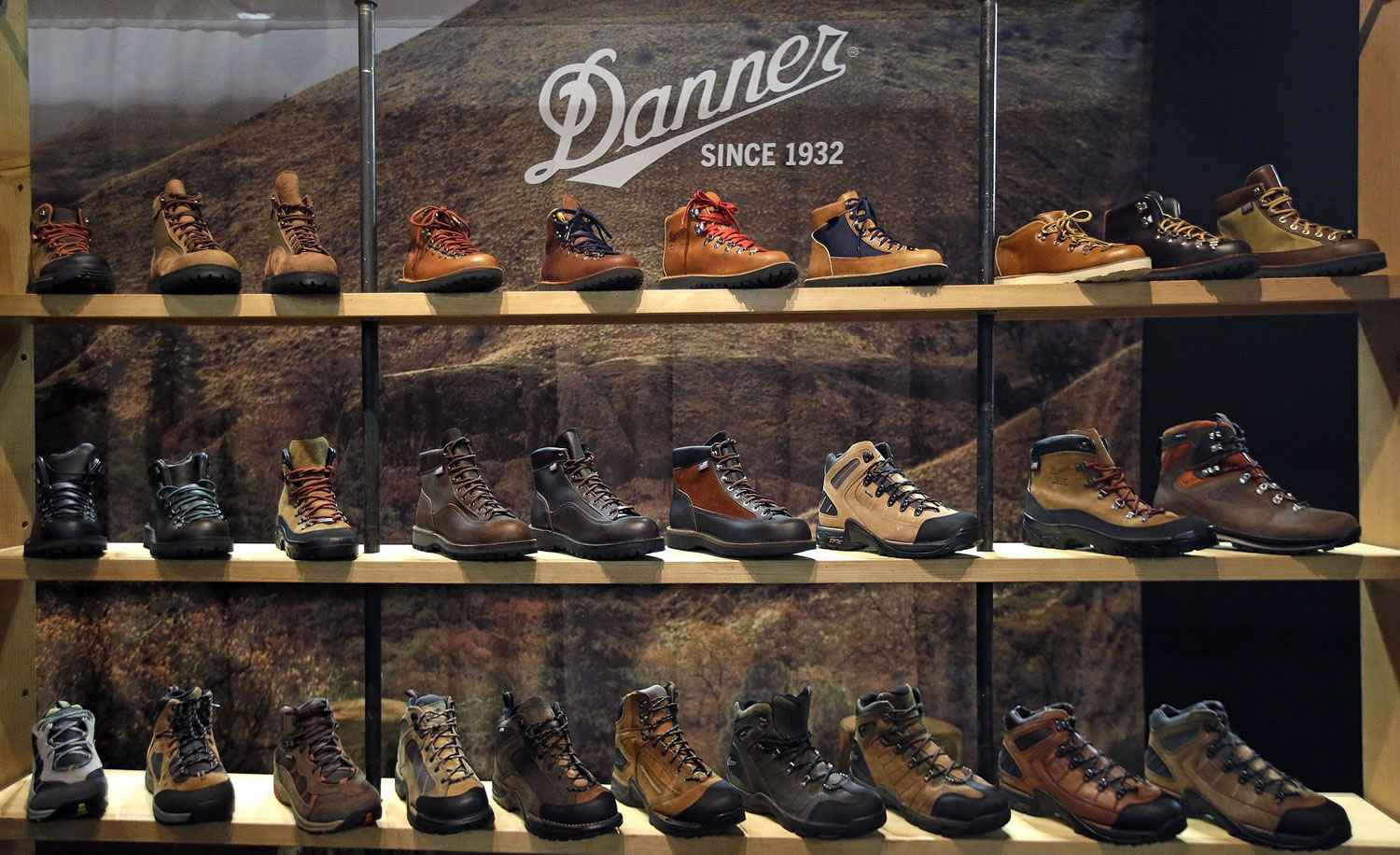 Hiking footwear is displayed at the Danner Boots booth at the Outdoor Retailer Show in Salt Lake City.