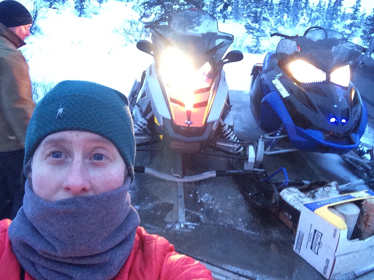 Beth Ipsen takes a selfie showing her clothing and snowmobiles in 2013 before heading out in the wilderness near Cantwell, Alaska.