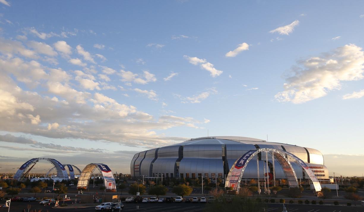 The surrounding area around University of Phoenix Stadium takes shape for Super Bowl XLIX in Glendale, Ariz. (AP Photo/Ross D.