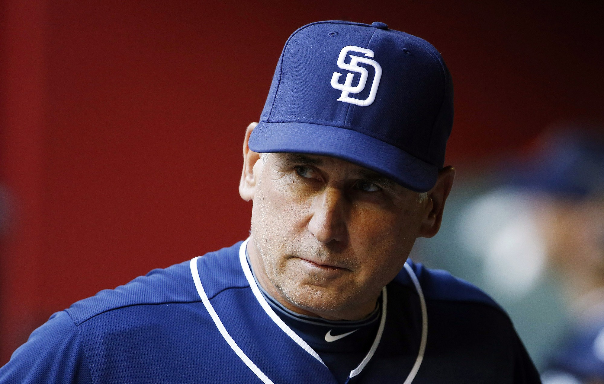 San Diego Padres' Bud Black paces in the dugout prior to a baseball game against the Arizona Diamondbacks in Phoenix. The Padres fired Black on Monday, June 15, 2015, after hovering around .500 with a roster that was overhauled in the offseason. (AP Photo/Ross D.