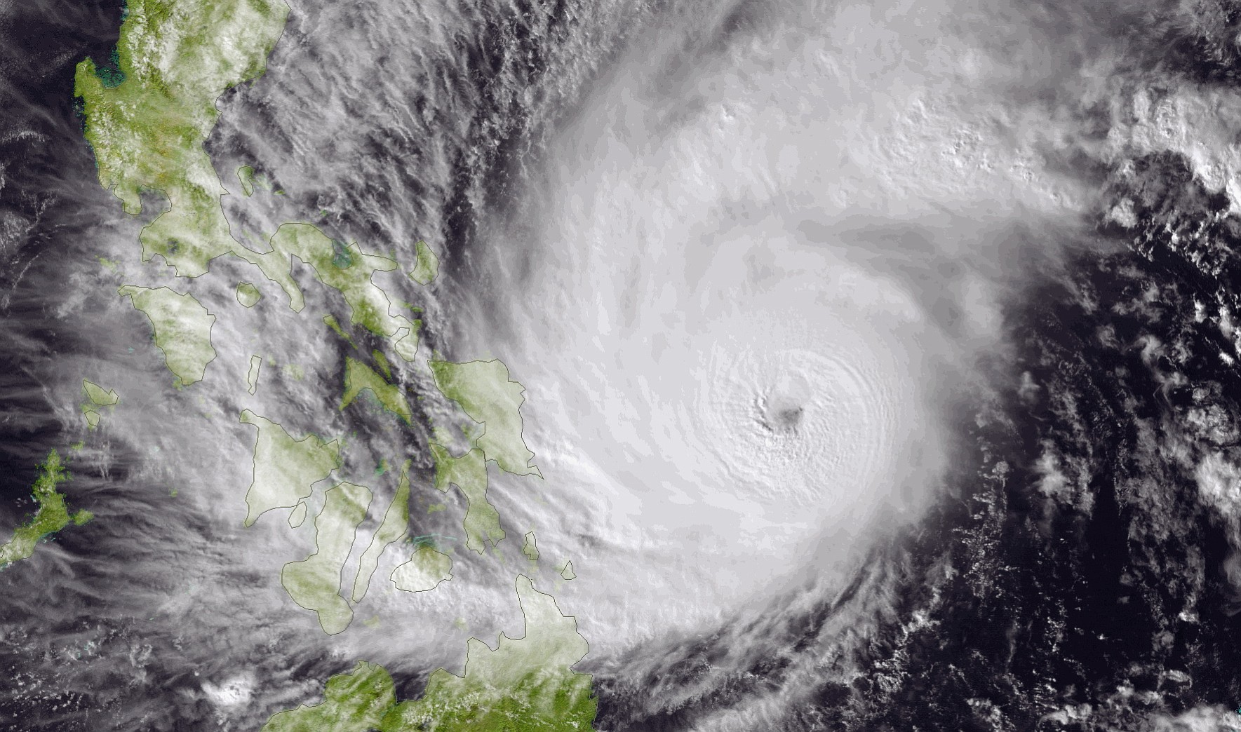 This image made available by the National Oceanic and Atmospheric Administration (NOAA) shows Typhoon Hagupit on Friday, Dec. 5, 2014, as it approaches the Philippines. The ferocious and dangerously erratic typhoon is blowing closer to the Philippines as differing forecasts about its path prompt a wide swath of the country to prepare for a weekend of destructive winds and rain.