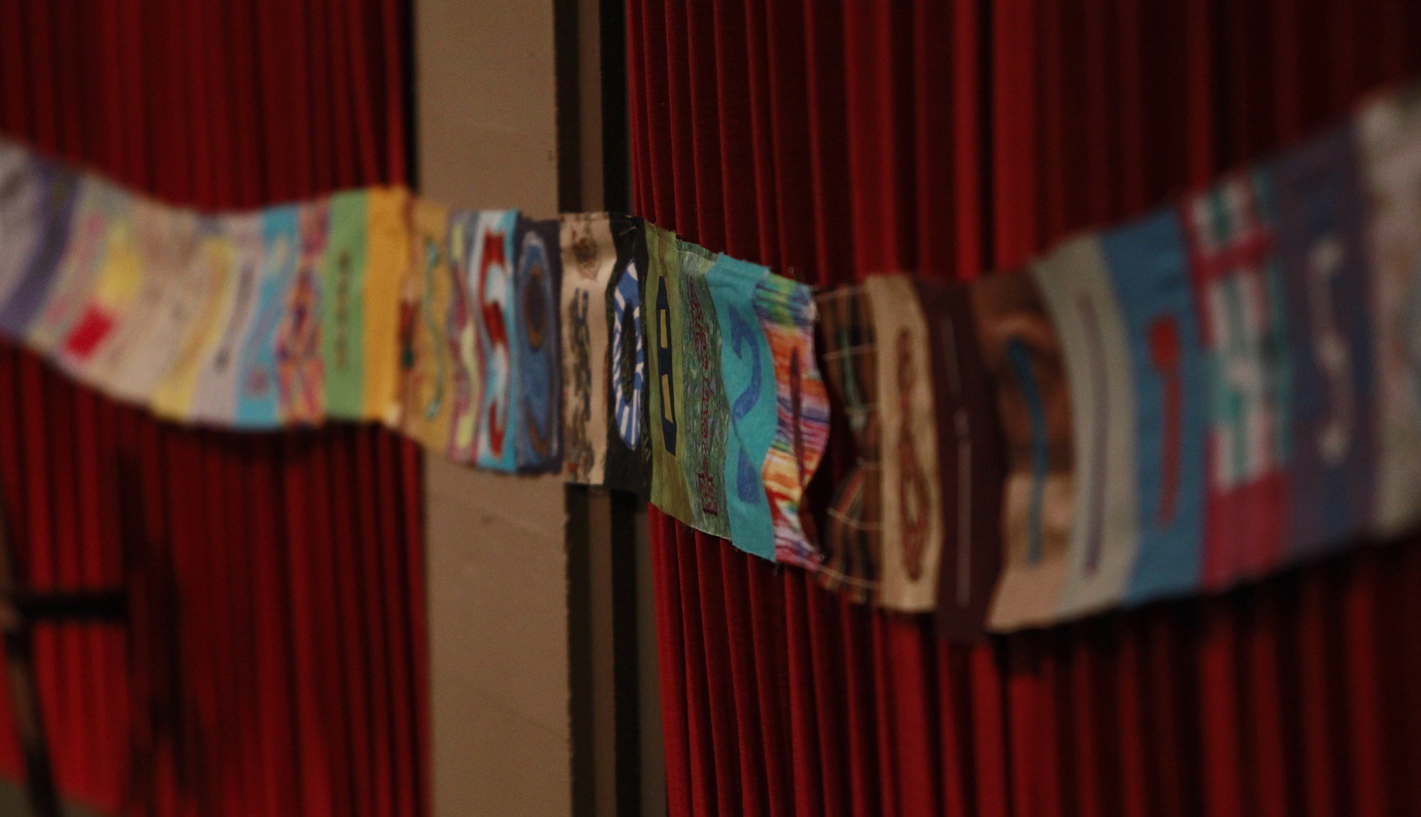 Pi Day volunteers hung a 1/4 mile long banner at Kiggins theater Saturday.