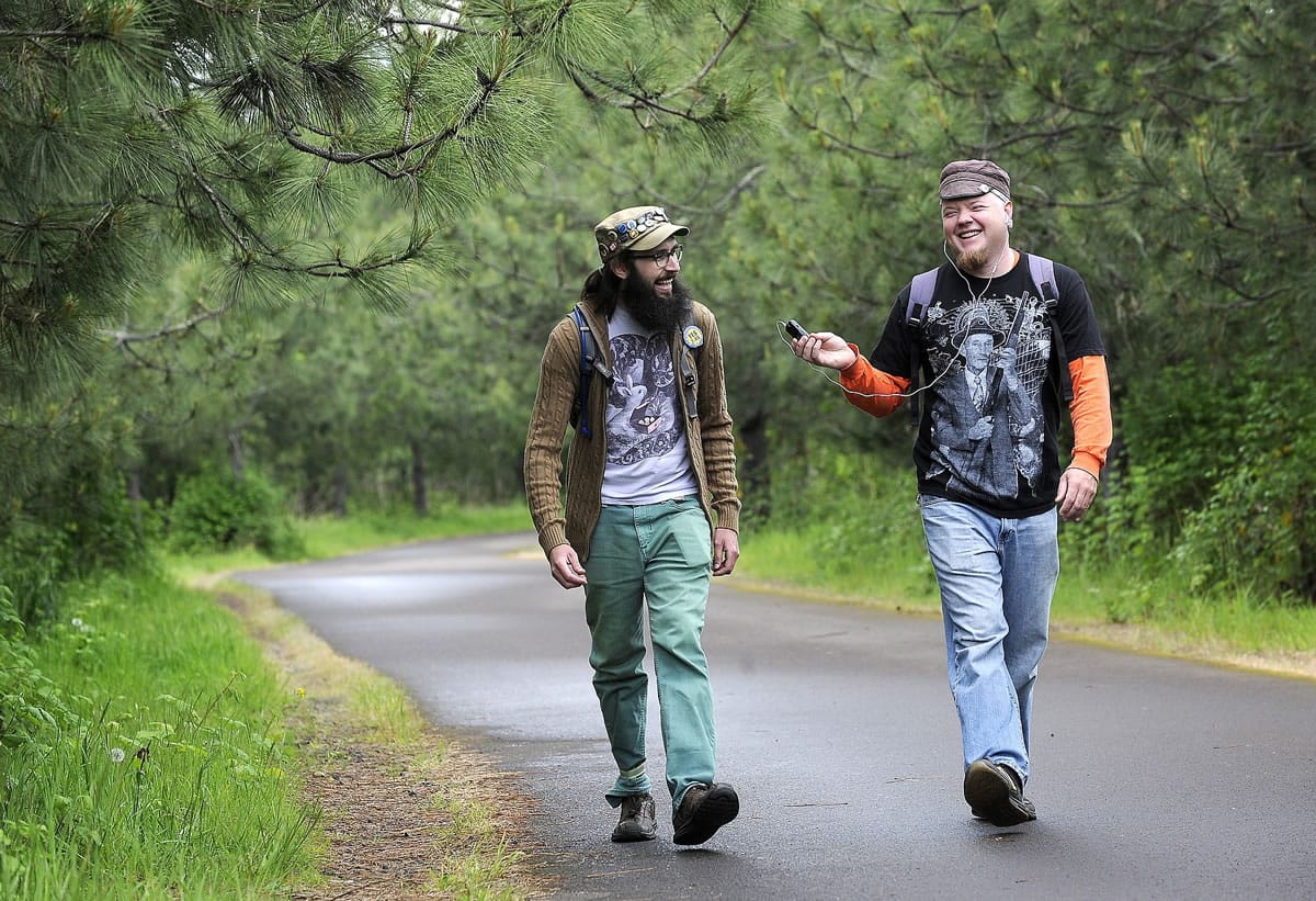 Podcaster Dan Crall, right, and Cheyne Willems record an episode May 14 at Willamette Park in Corvallis, Ore.