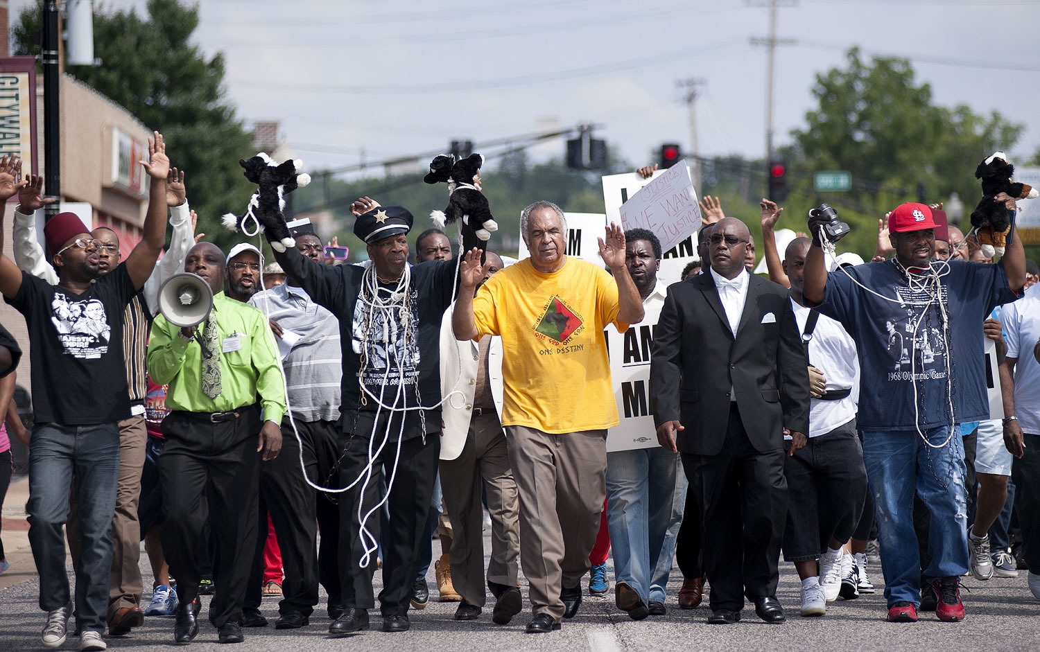 Protesters fill Florissant Road in downtown Ferguson, Mo., on  Monday marching along the closed street.