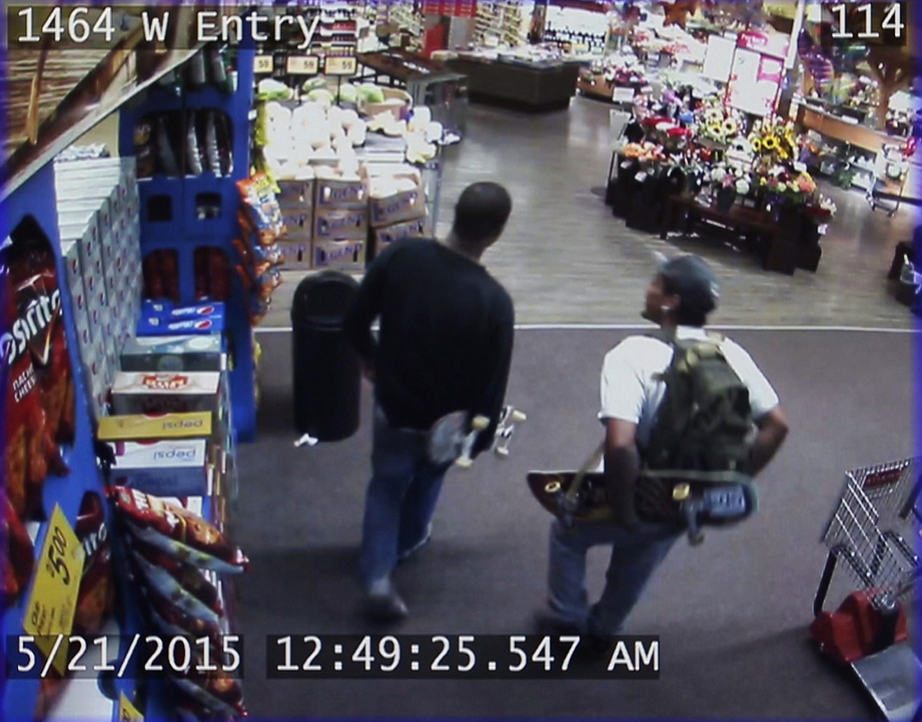 Two men leave a Safeway store May 21 in Olympia. An Olympia police officer responded around 1 a.m.
