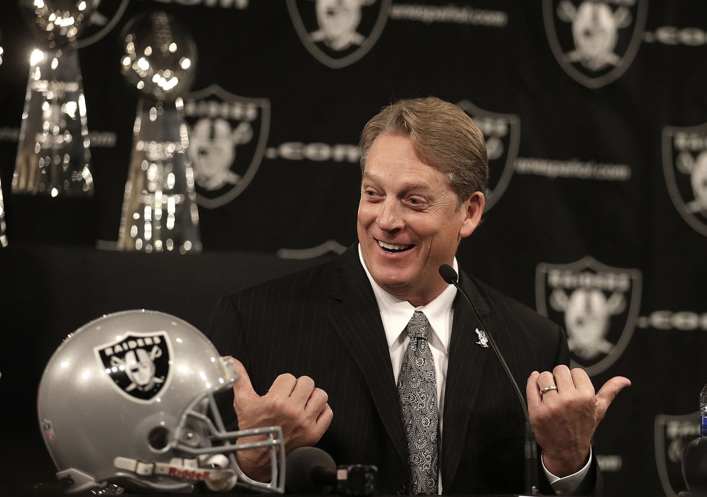 New Oakland Raiders coach Jack Del Rio gestures during a news conference Friday, Jan. 16, 2015, in Alameda, Calif.