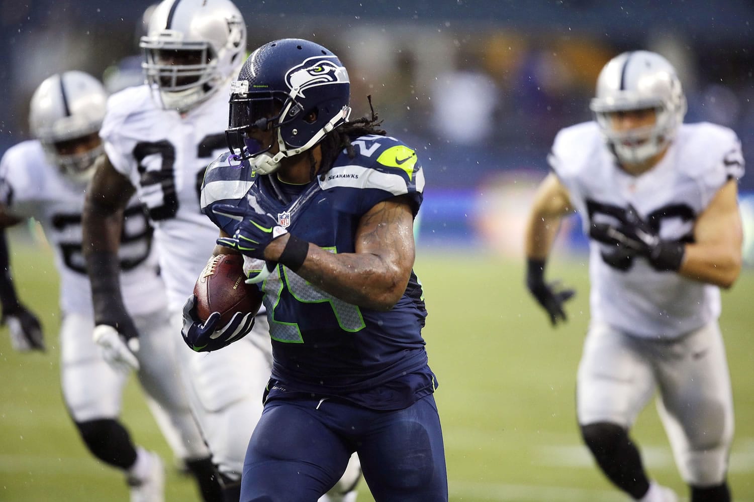 Seattle Seahawks running back Marshawn Lynch runs against the Oakland Raiders in the second half Sunday, Nov. 2, 2014, in Seattle. Lynch scored two touchdowns in the 30-24 win.