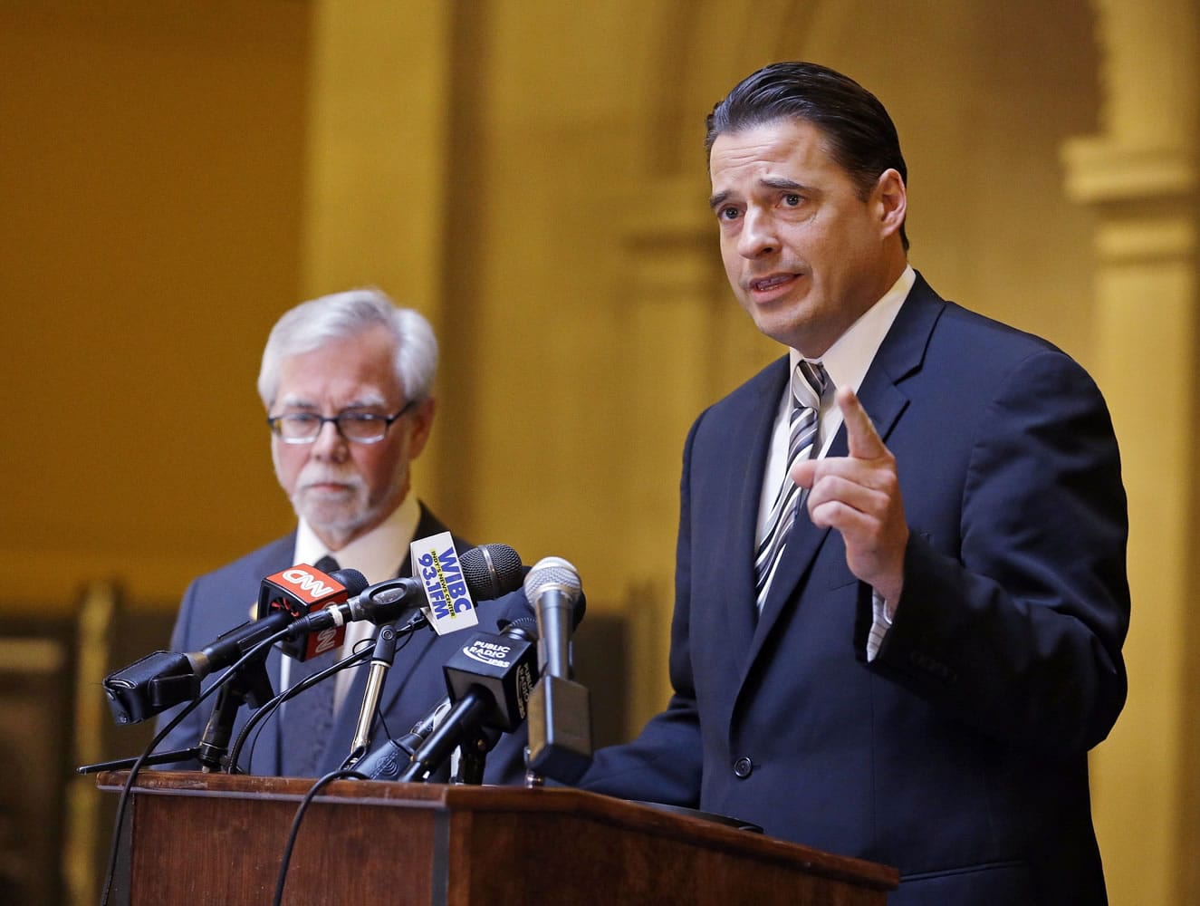 Indiana Senate Democratic Leader Tim Lanane, left, D-Anderson, and Indiana House Democratic Leader Scott Pelath, D-Michigan City, call for the repeal of the Indiana Religious Freedom Restoration Act during a press conference at the Statehouse in Indianapolis on Monday.