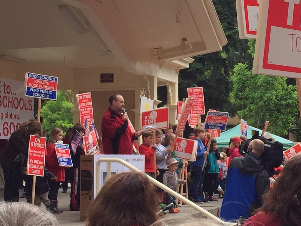 Rob Lutz, president of the Evergreen Education Association, speaks to teachers at the Esther Short Park rally this morning.