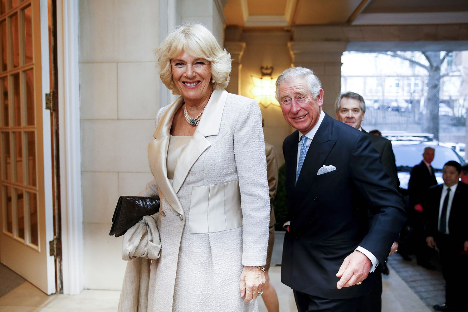 Britain's Prince Charles and Camilla, the Duchess of Cornwall, arrive for a reception at the British Ambassador's residence on Tuesday in Washington.