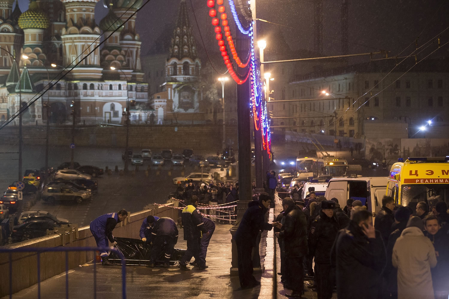 Medics put the the body of Boris Nemtsov on a stretcher early Saturday at Red Square in Moscow. St.