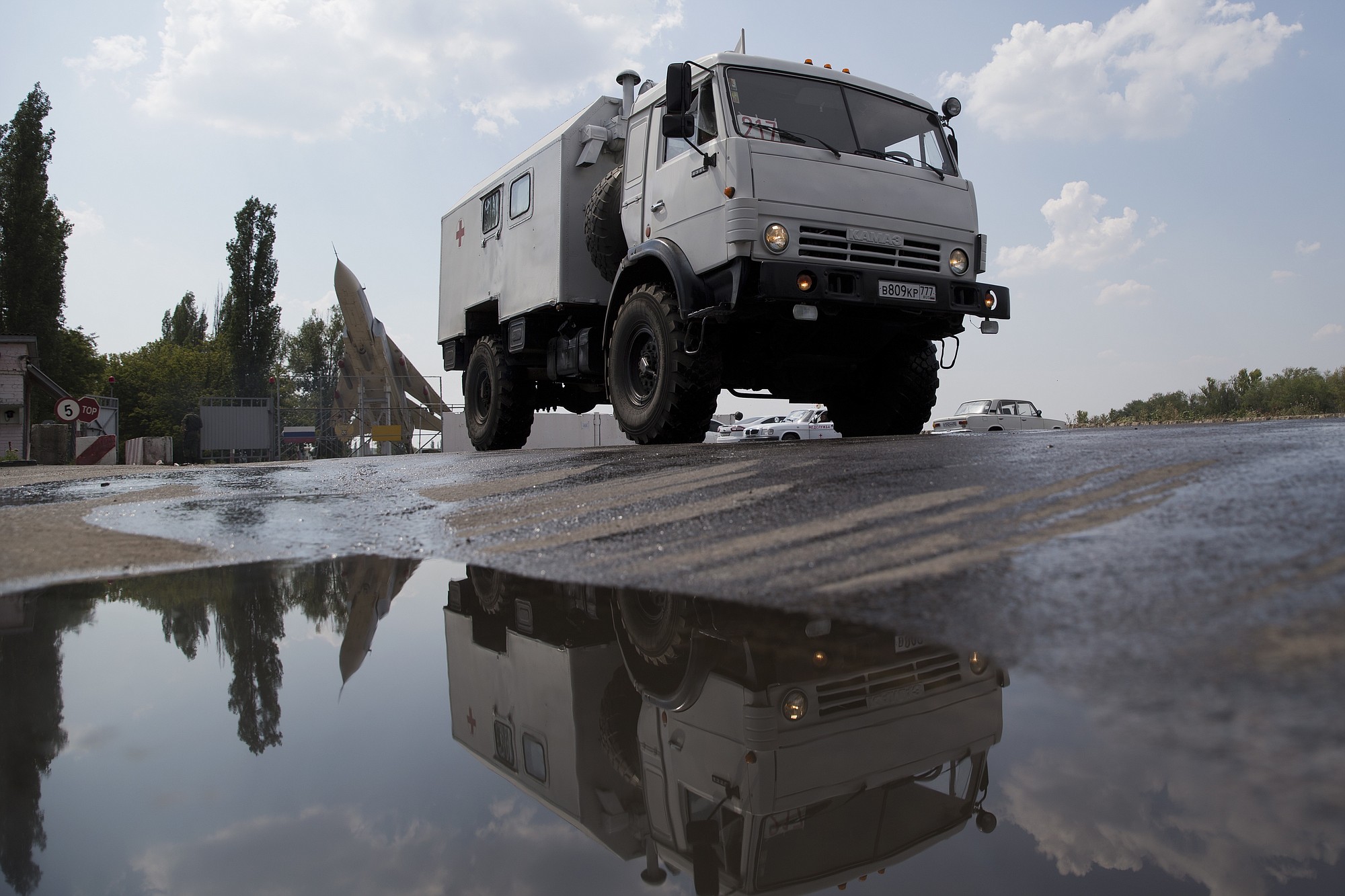 A truck moves out from the military base not far from Voronezh, Russia, on Wednesday.
