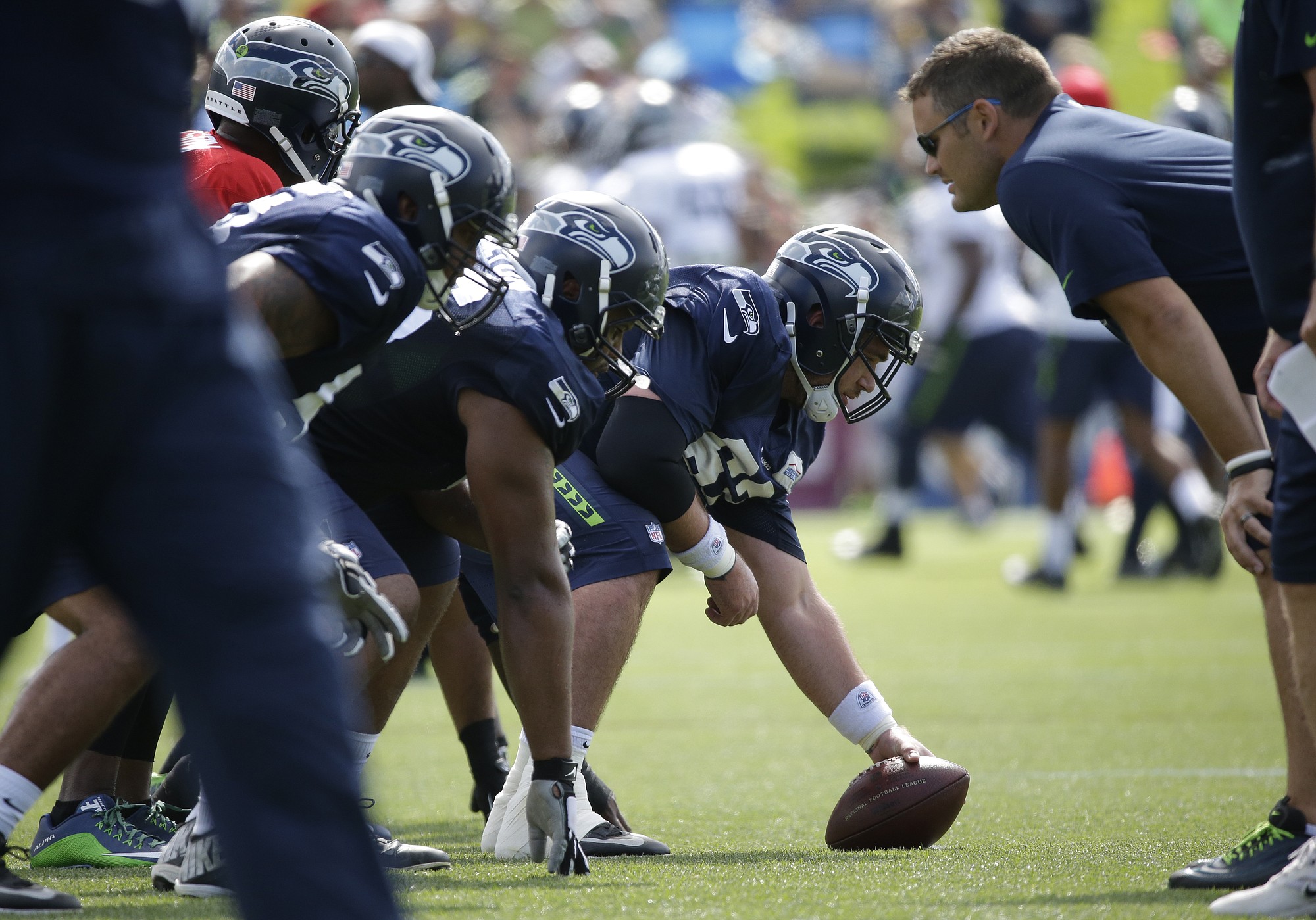 Seattle Seahawks center Drew Nowak gets ready to snap the ball during training camp Thursday, Aug. 6, 2015, in Renton.