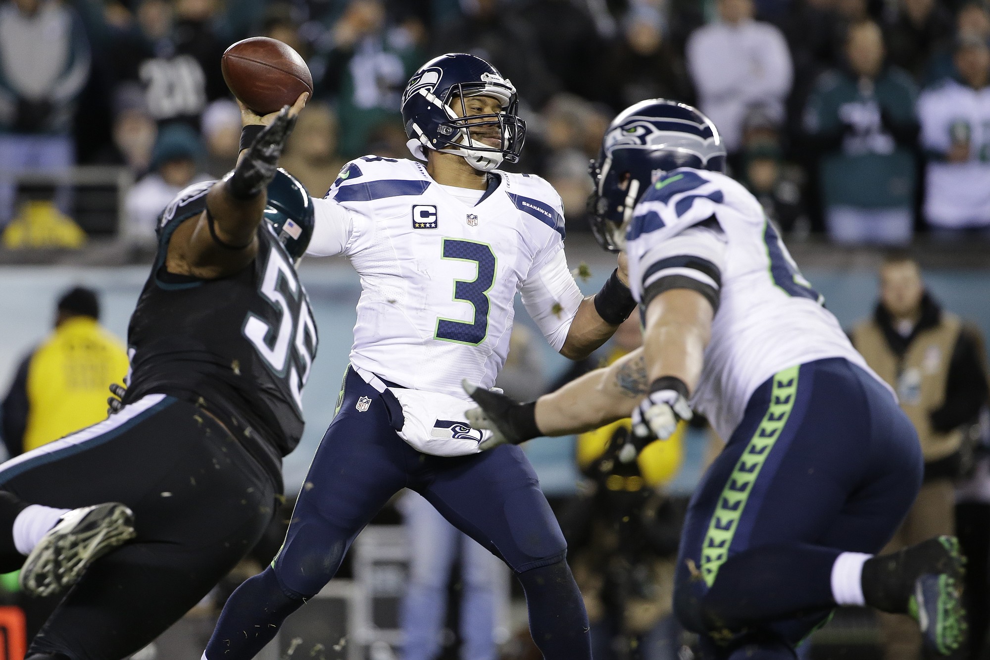 Seattle Seahawks' Russell Wilson passes during the second half against the Philadelphia Eagles, on Sunday, Dec. 7, 2014, in Philadelphia. Wilson had 263 passing yards and two TD passes in the 24-14 Seahawks' victory.