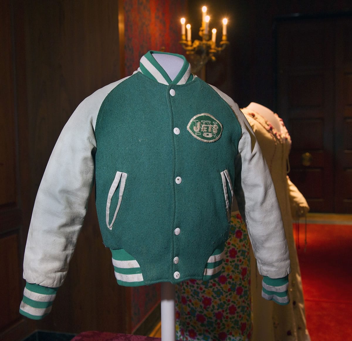 The iconic New York Jets jacket worn by actor Fred Savage in the award-winning TV series &quot;The Wonder Years&quot; is displayed during a ceremony Tuesday to donate show memorabilia to the Smithsonian's National Museum of American History in Washington.