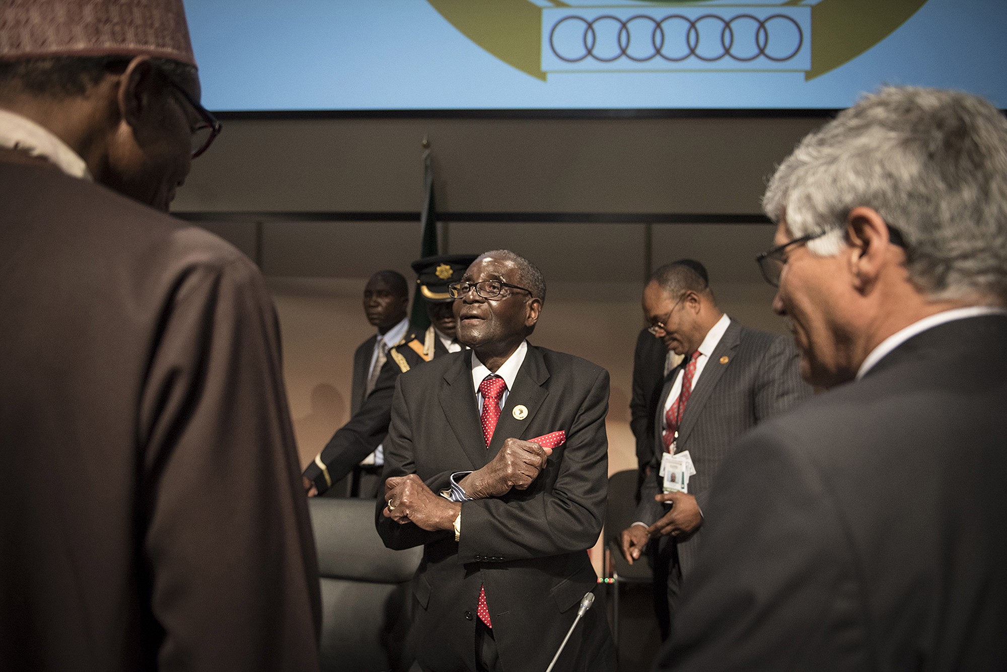 Zimbabwe president, and chair of the African Unity Summit, Robert Mugabe, center, speaks to delegates at the end 25th AU Summit in Johannesburg on Monday.