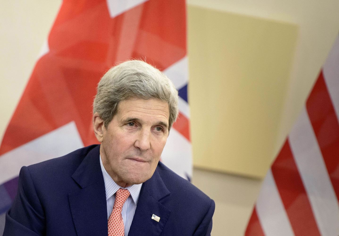 Secretary of State John Kerry waits for the start of a trilateral meeting Saturday in Lausanne, Switzerland.