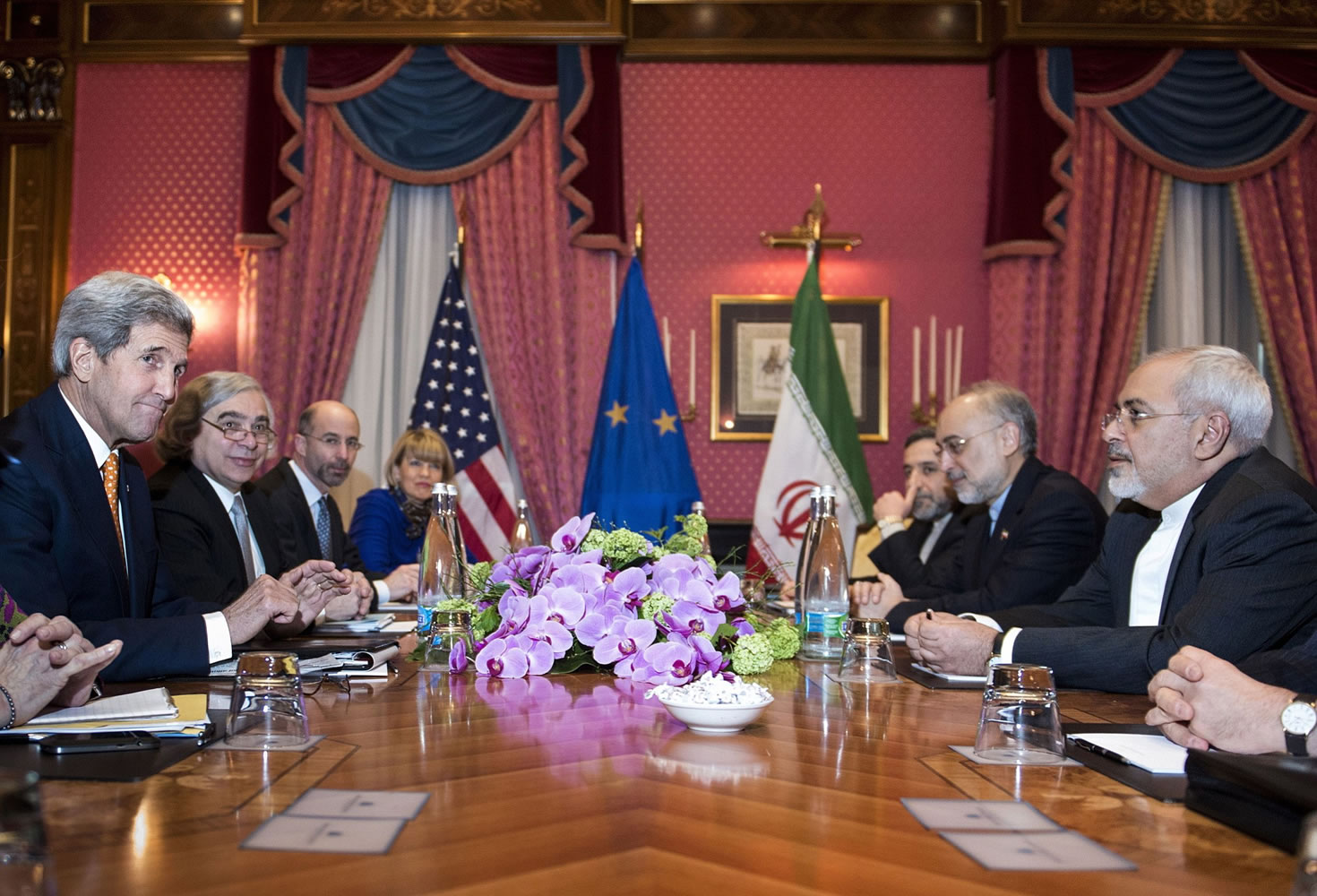 U.S. Secretary of State John Kerry, left, U.S. Secretary of Energy Ernest Moniz, second left,  National Security Council point person on the Middle East Robert Malley, third left, and European Union Political Director Helga Schmid.