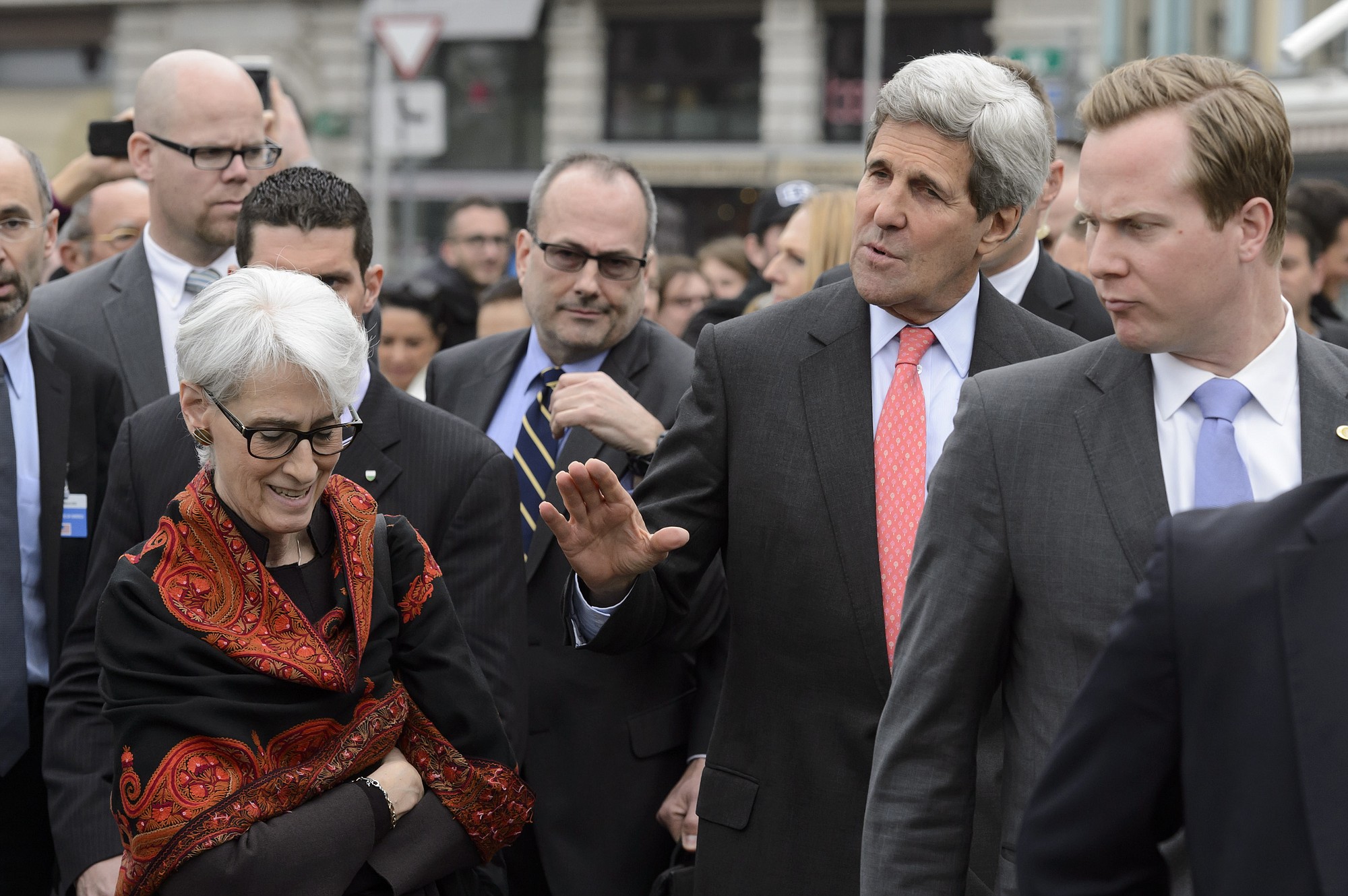 U.S. Secretary of State John Kerry, right, walks Friday with Wendy Sherman, left, U.S. Under Secretary of State for Political Affairs, outside the hotel after lunch at the Creperie d'Ouchy during a break from a bilateral meeting with Iranian Foreign Minister Mohammad Javad Zarif for a new round of Iran nuclear talks, in Lausanne, Switzerland.