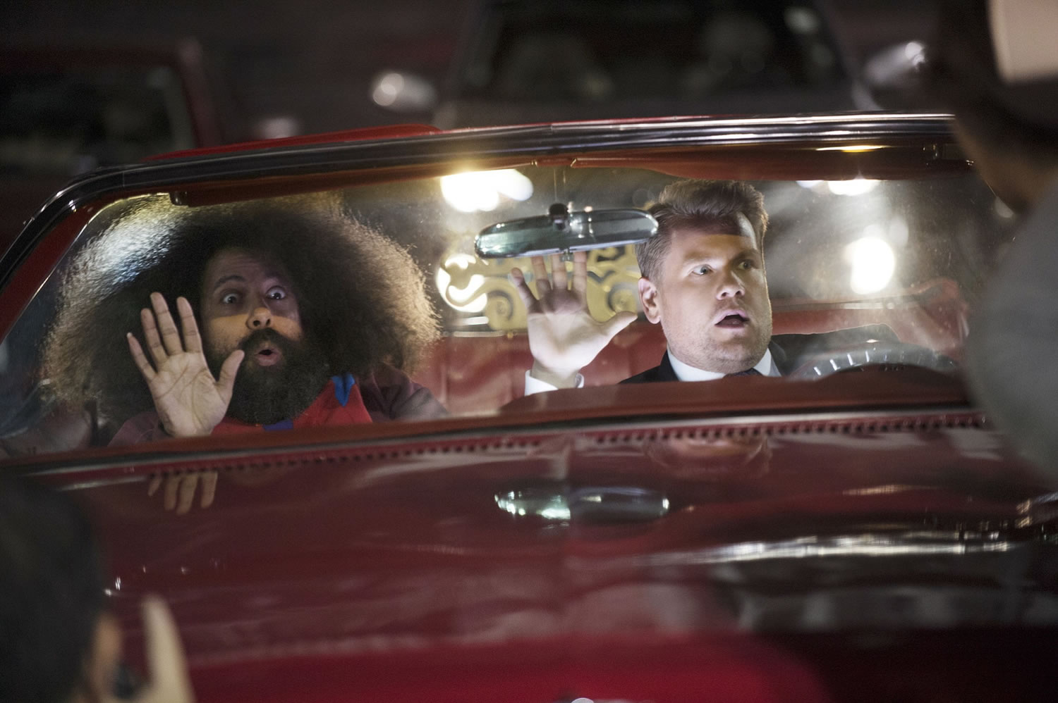 Reggie Watts, left, and James Corden tape the opening titles for &quot;The Late Late Show with James Corden,&quot; which debuted Monday.