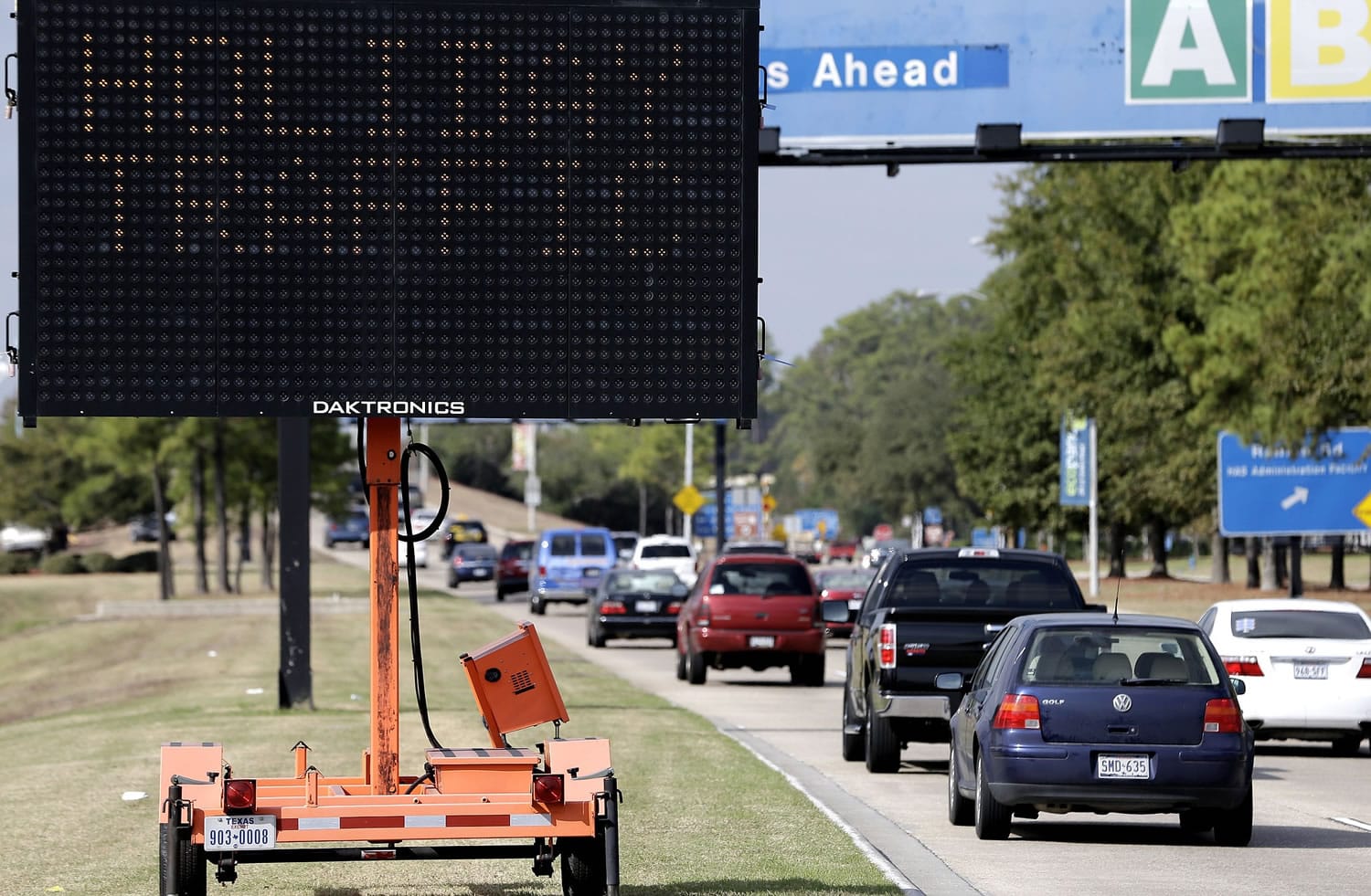 A sign alerts travelers to expect holiday traffic at George Bush Intercontinental Airport in Houston.