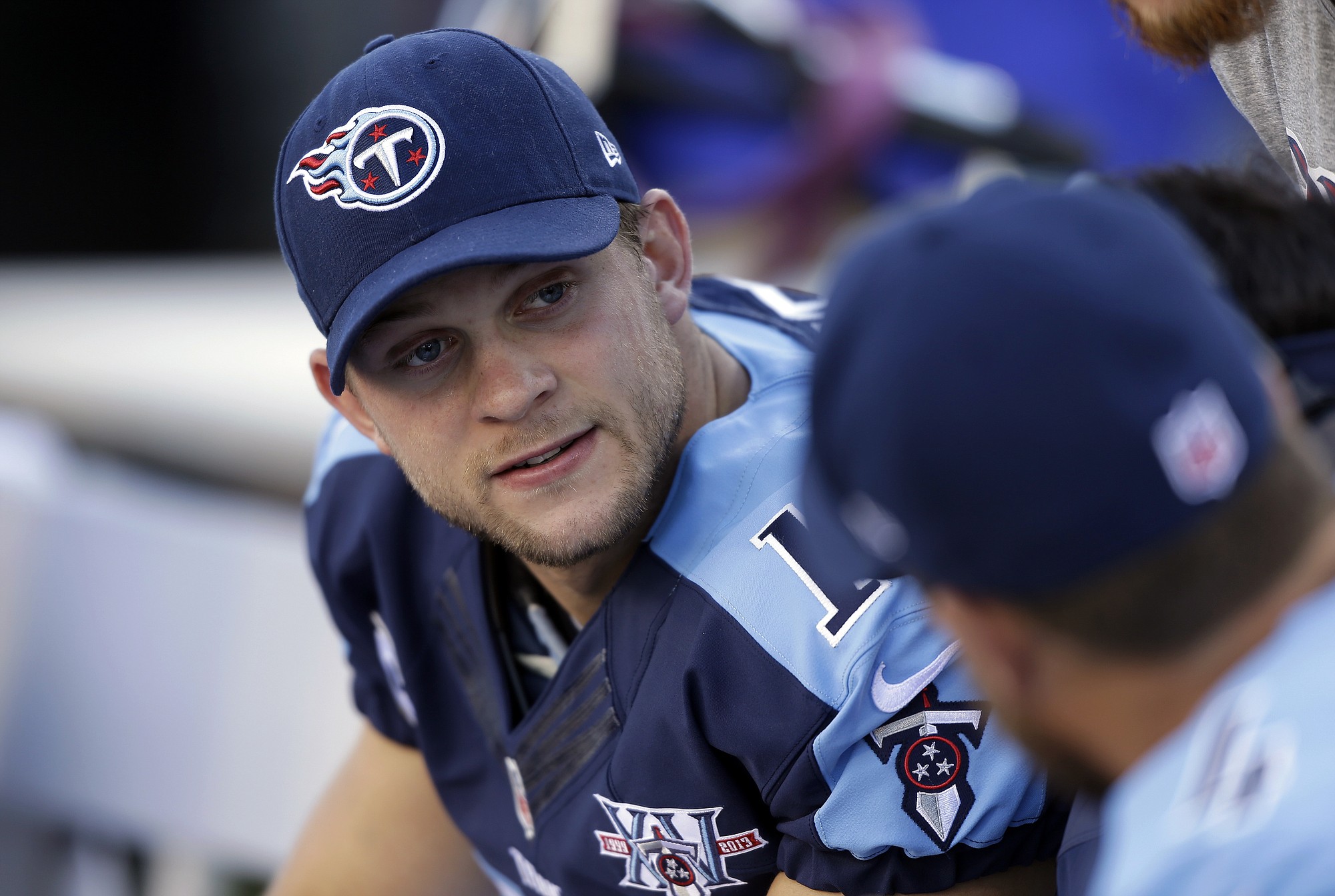 FILE - In this Oct. 20, 2013, file photo, Tennessee Titans quarterback Jake Locker talks on the sideline during the first quarter of an NFL football game against the San Francisco 49ers in Nashville, Tenn. Locker is retiring from football rather than hit free agency after four NFL seasons with the e Titans. He says in a statement Tuesday, March 10, 2015, that he no longer has the &quot;burning desire&quot; needed to keep playing the game for a living.