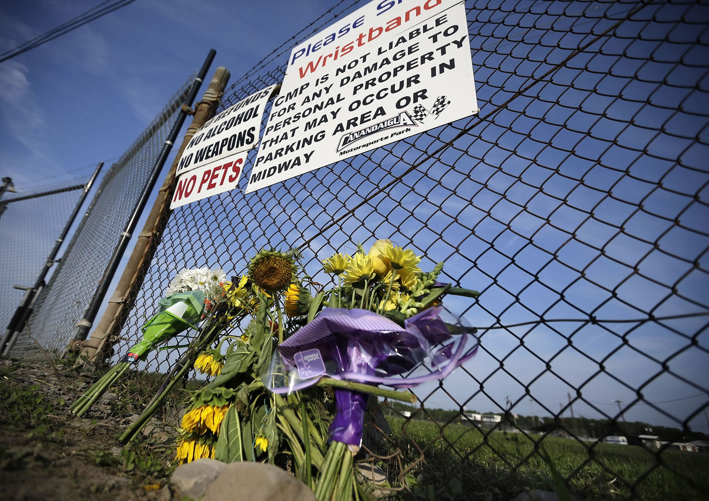 A small memorial of flowers is seen at Canandaigua Motorsports Park on Monday in Canandaigua, N.Y.