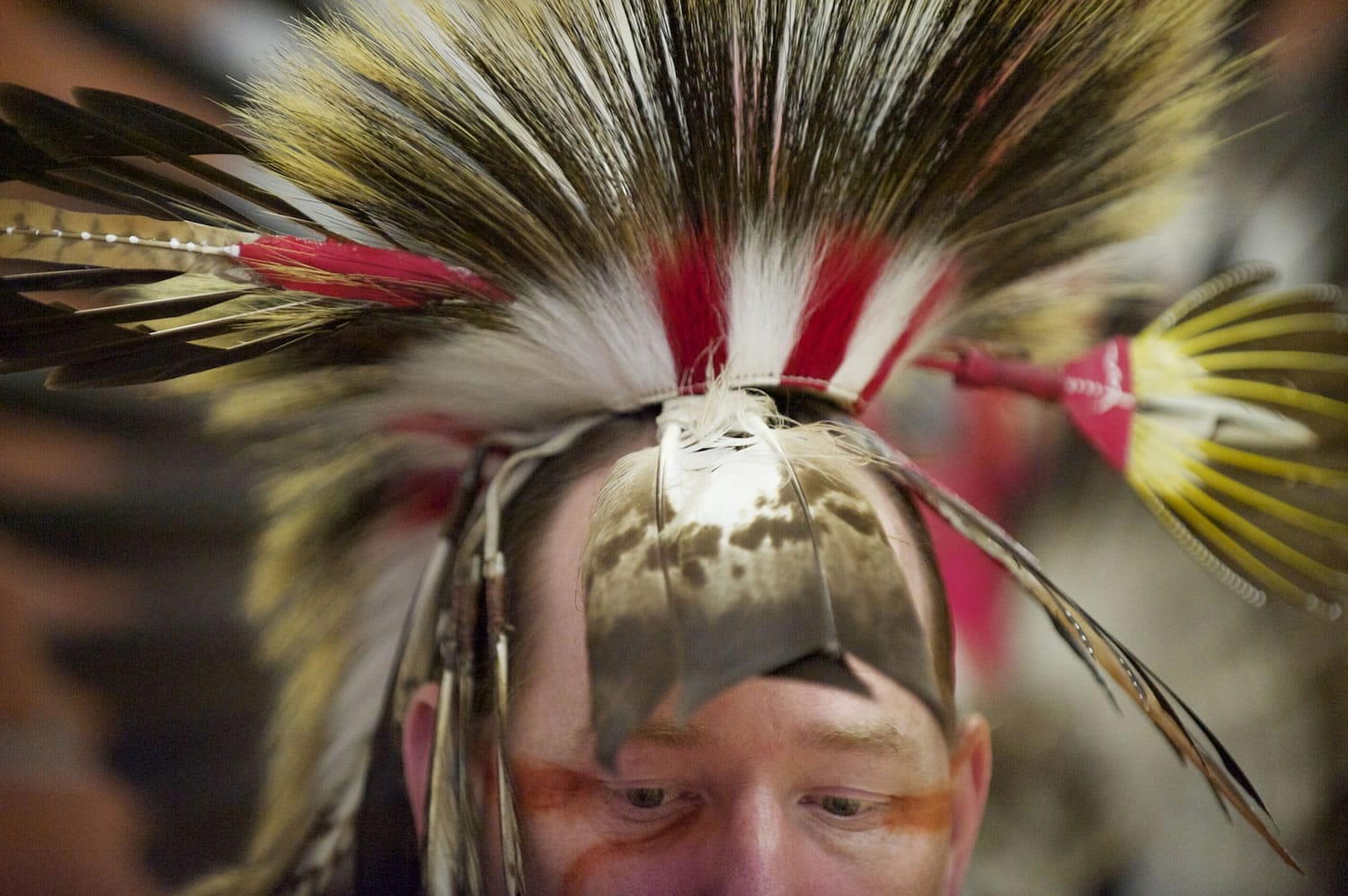 Elaborate headdresses are part of the regalia worn by dancers at the Native American Indian Education Program Title VII Traditional Pow-Wow at Covington Middle School, Saturday, March 2, 2013.