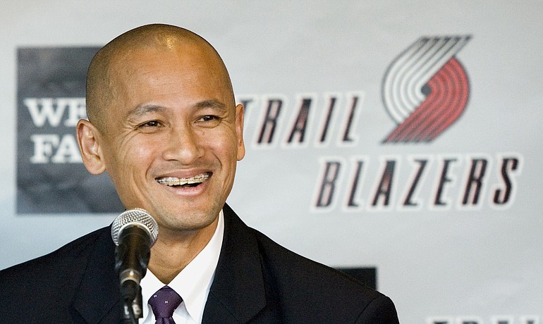 Former Oklahoma City Thunder assistant general manager Rich Cho smiles while he is introduced as the Portland Trail Blazers new general manager in Portland on Monday.