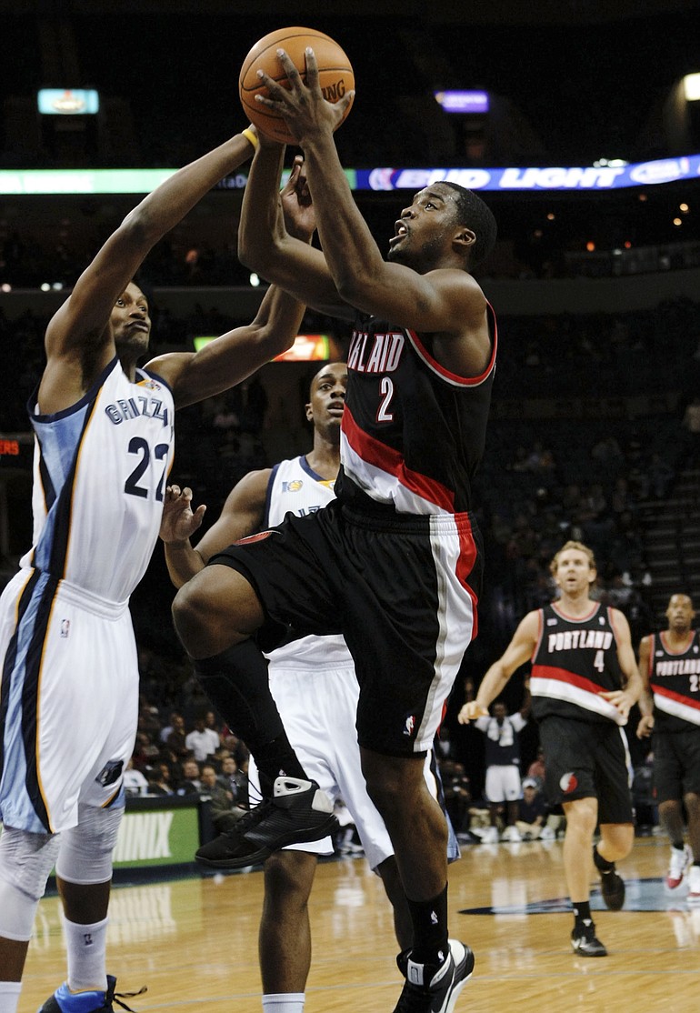 Portland Trail Blazers' Wesley Matthews (2) goes up for a shot as Memphis Grizzlies forward Rudy Gay (22) defends in the second half Tuesday. Matthews scored 30 points, 22 in the first half as the Blazers beat the Grizzlies 100-99.